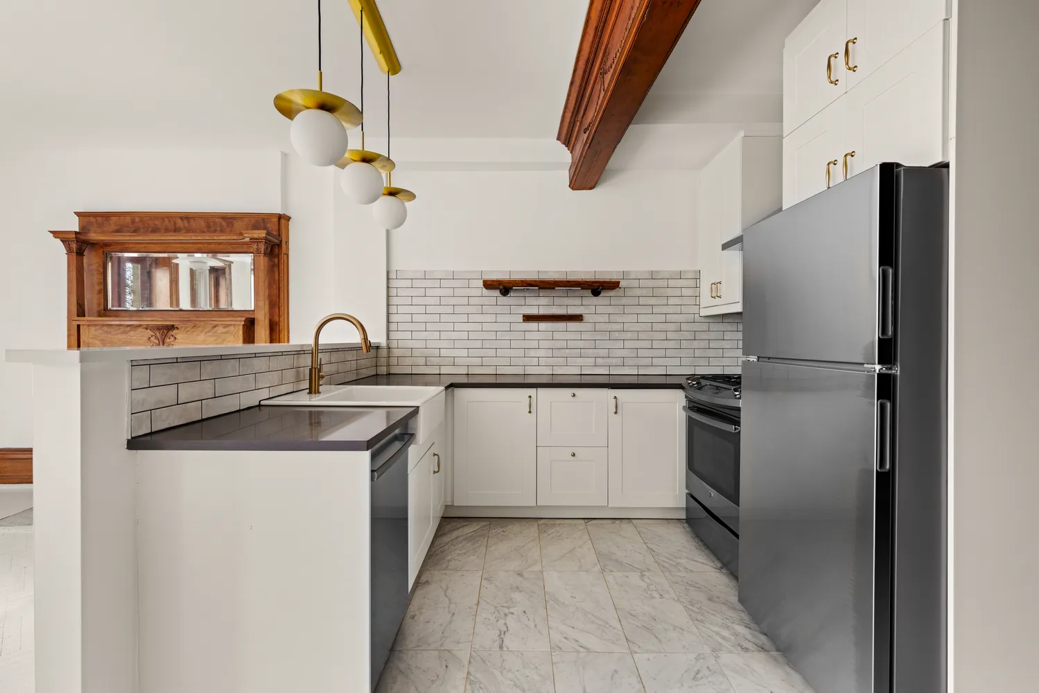 a kitchen with a sink and refrigerator