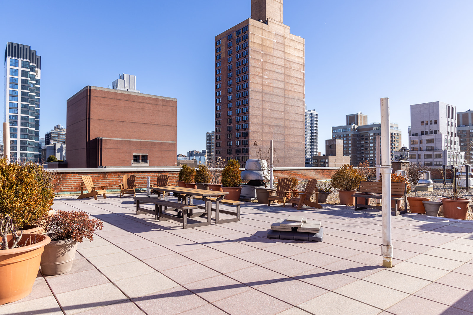 132 East 35th Street, Unit 7H Manhattan, NY 10016 - Photo 20 of 25 a cars parked in front of a building