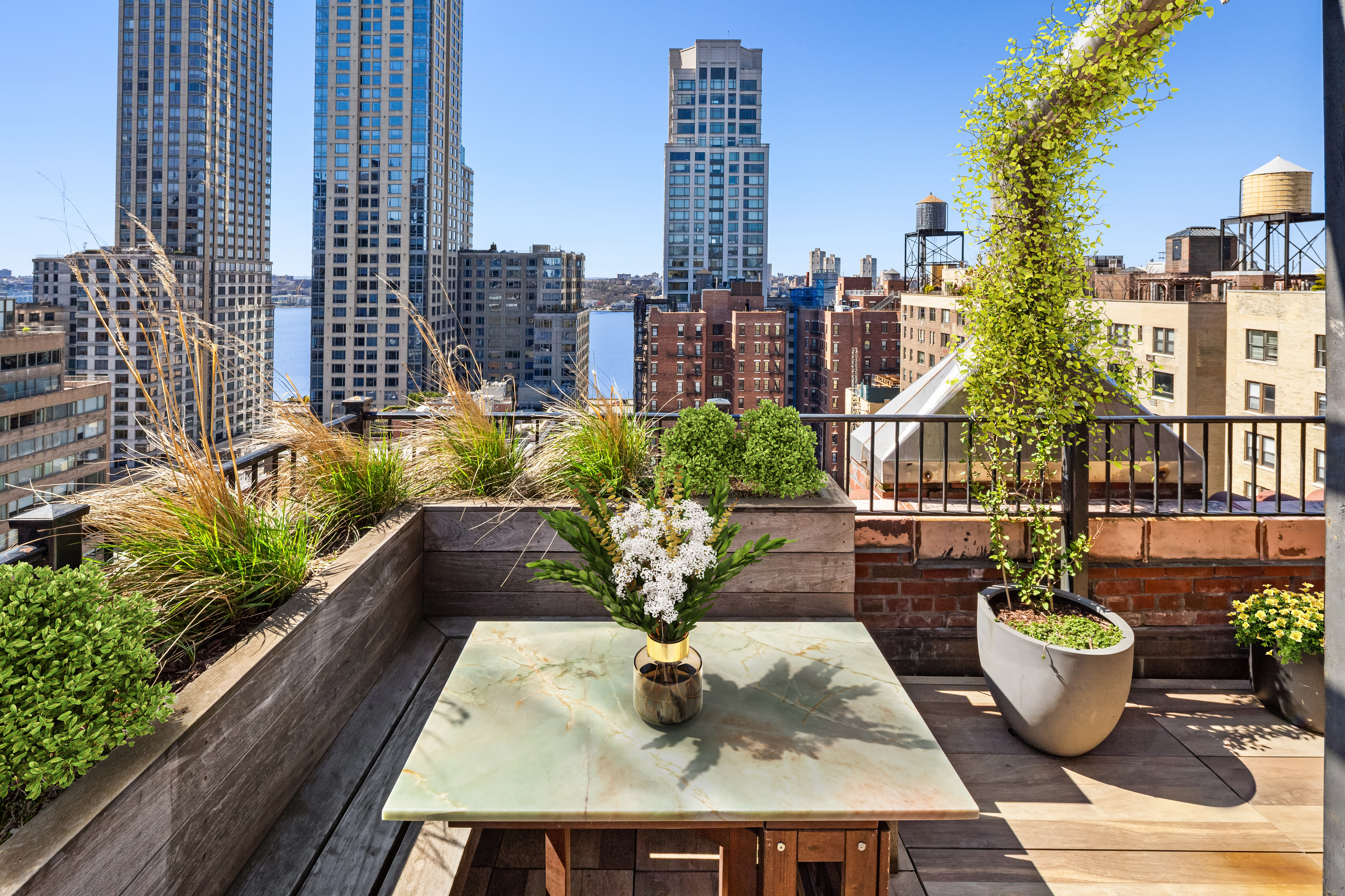 243 West End Avenue, Unit PH Manhattan, NY 10023 - Photo 10 of 11 a view of balcony with furniture and a potted plant