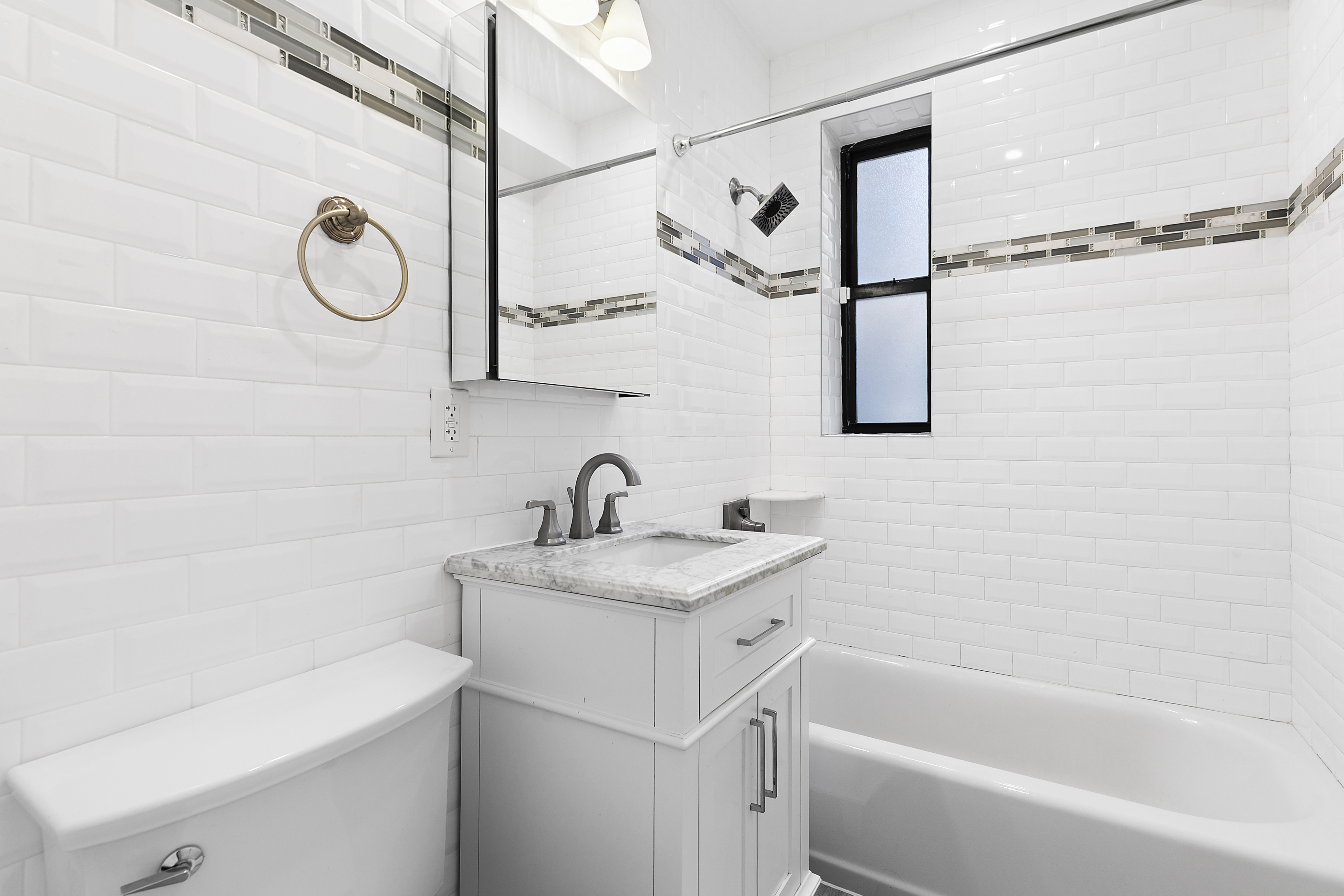 159-34 Riverside Drive West, Unit 1J90 Manhattan, NY 10032 - Photo 10 of 19 a bathroom that has a sink and a bath tub