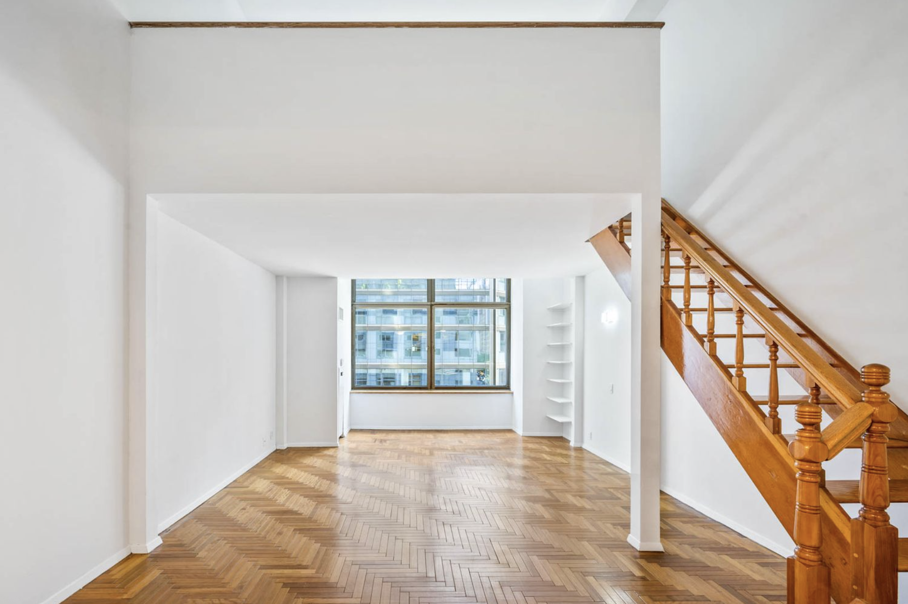 301 West 57th Street, Unit 3E Manhattan, NY 10019 - Photo 3 of 13 a view of an entryway with wooden floor