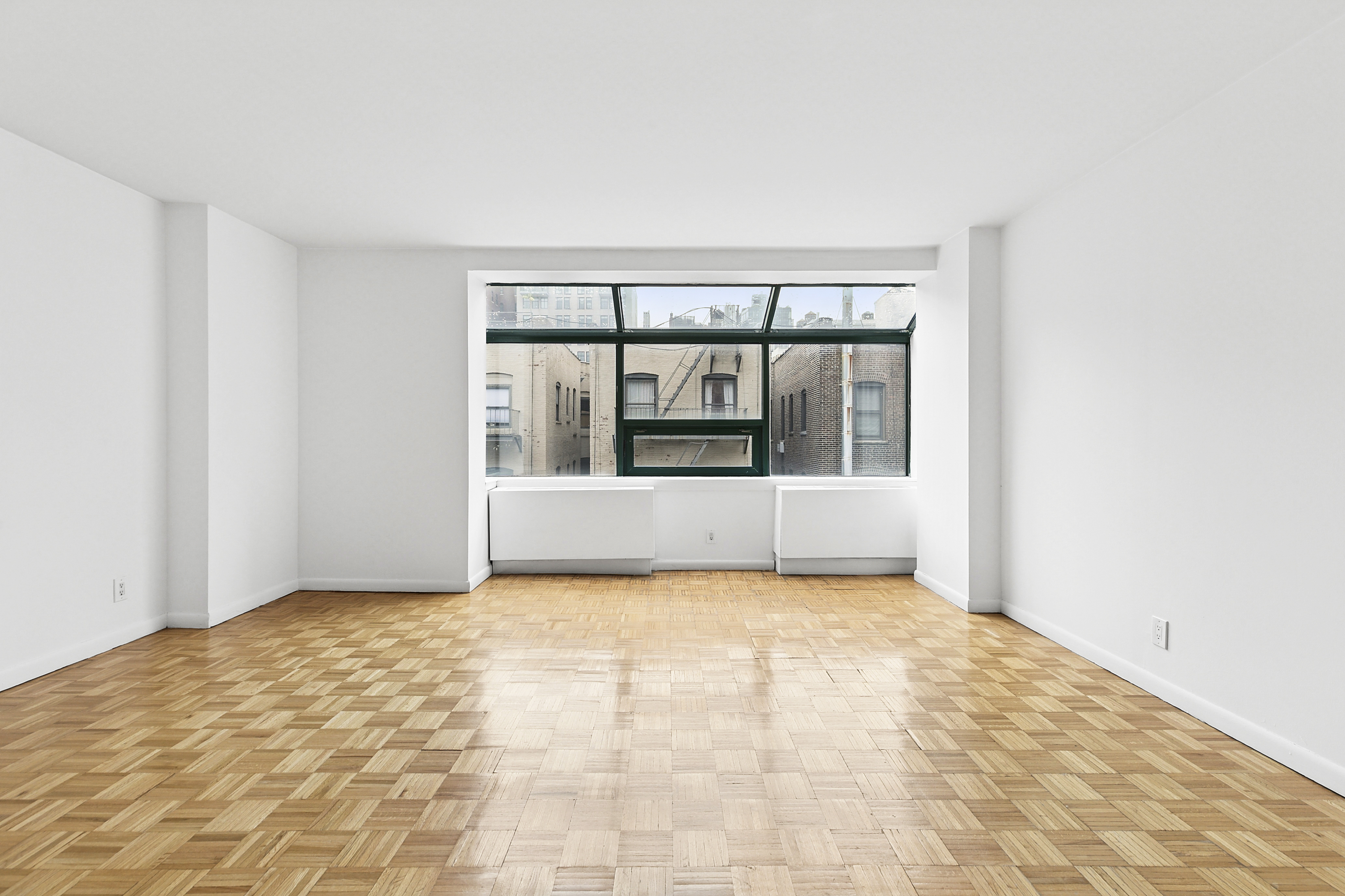 2250 Broadway, Unit 6K Manhattan, NY 10024 - Photo 2 of 15 a view of an empty room with a window