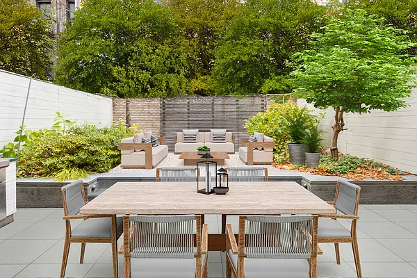 215 Sullivan Street, Unit THC Manhattan, NY 10012 - Photo 5 of 16 a outdoor dining space with furniture and potted plants