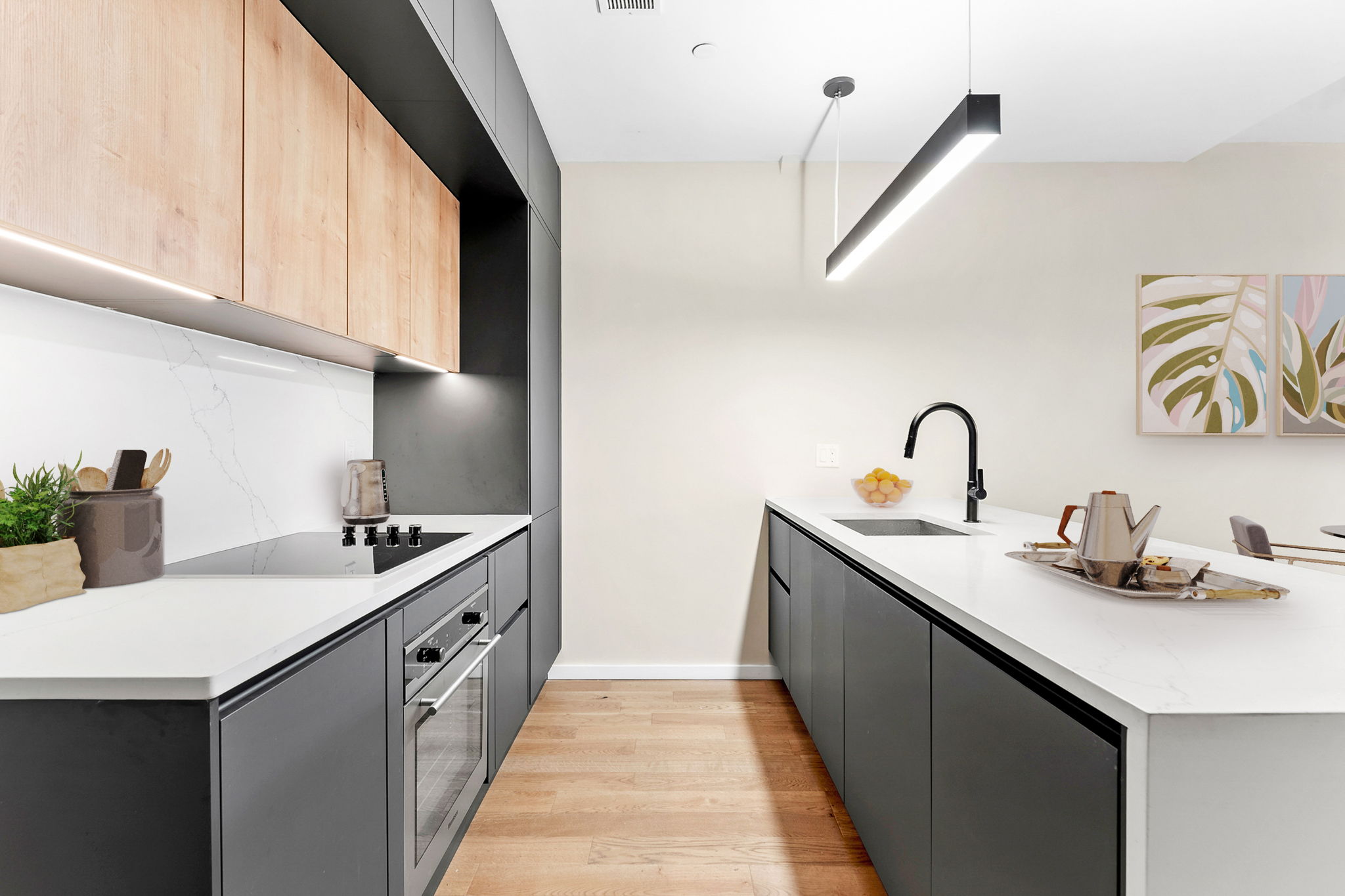 159 East 118th Street, Unit 4B Manhattan, NY 10035 - Photo 3 of 14 a en suite bathroom with a double vanity sink and a wooden floor