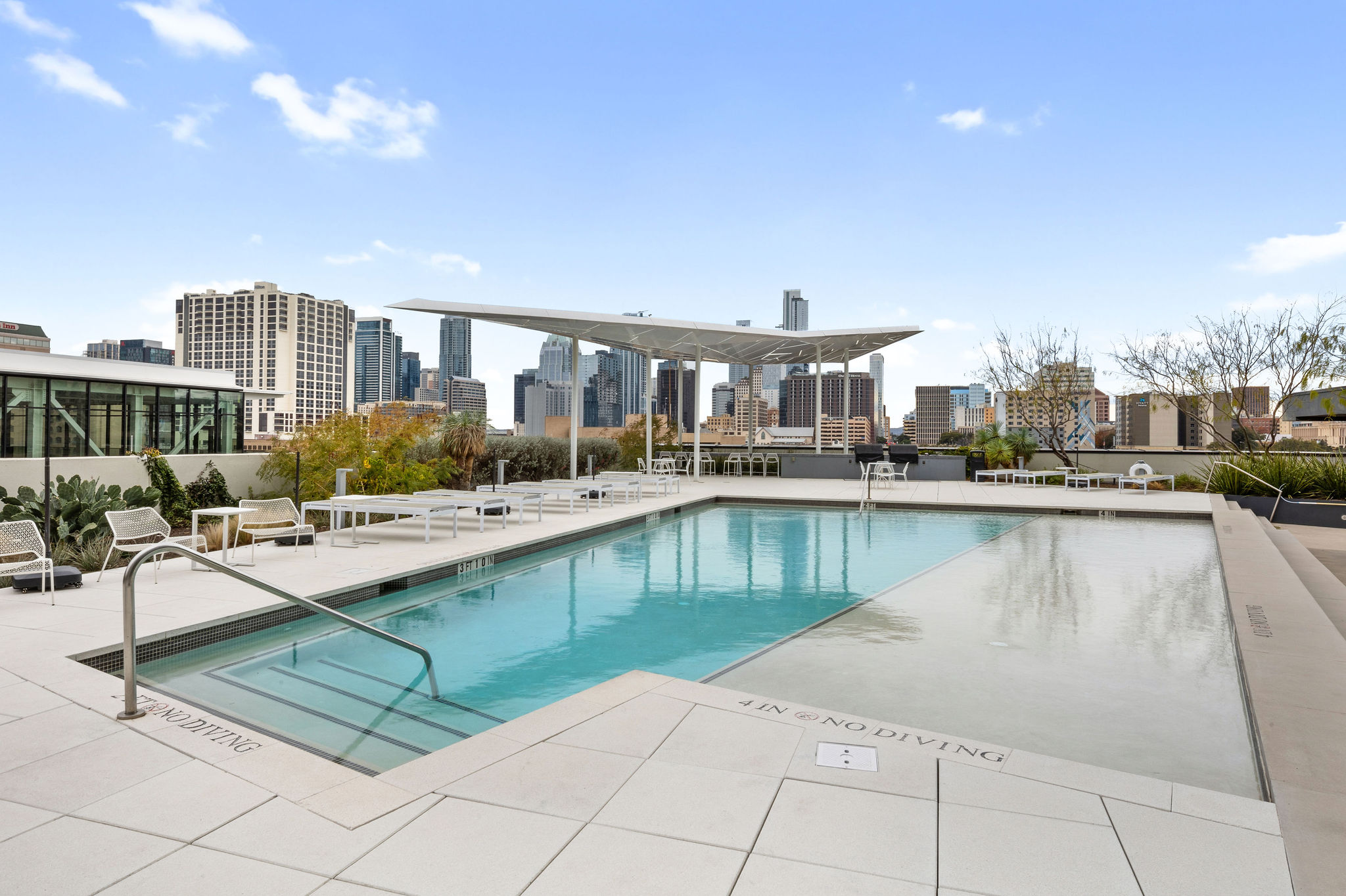 800 Embassy Drive, Unit 236 Austin, TX 78702 - Photo 14 of 50 a view of a swimming pool and outdoor space