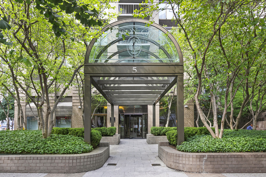 5 East 22nd Street, Unit 28M Manhattan, NY 10010 - Photo 10 of 11 front view of a house with a small yard