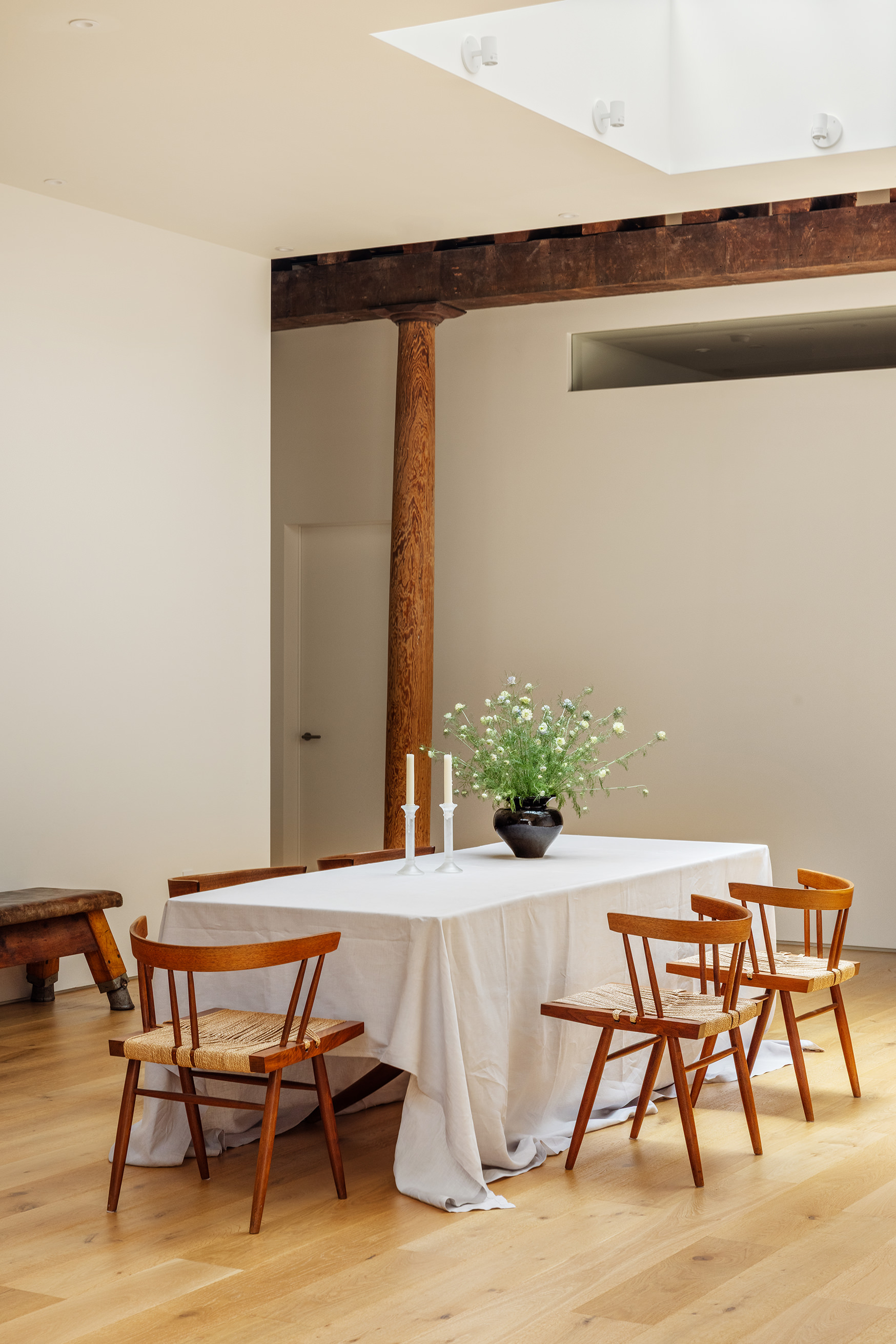 477 Broome Street Manhattan, NY 10013 - Photo 6 of 18 a view of a dining room with furniture and wooden floor