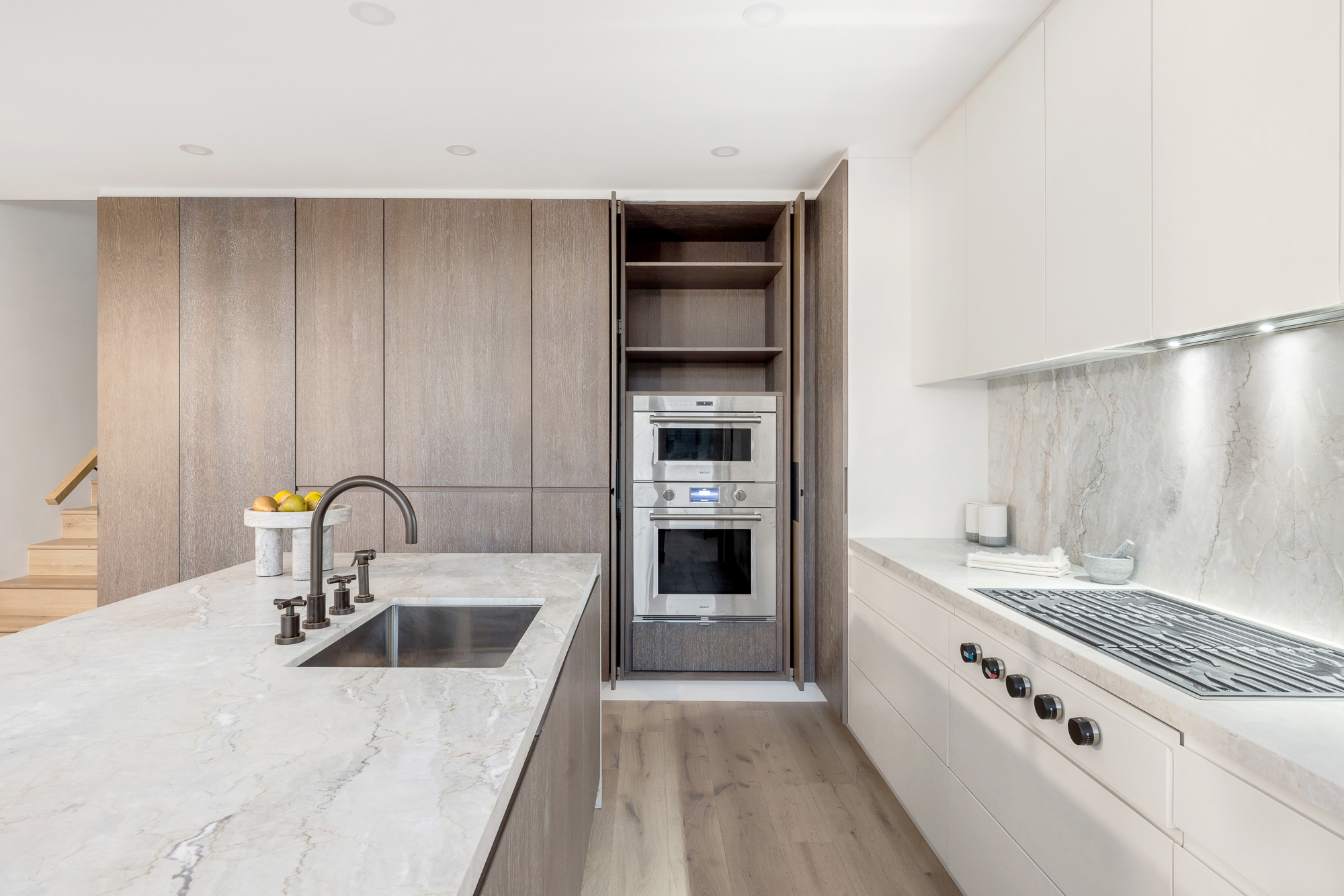 66 Clinton Street, Unit PH Manhattan, NY 10002 - Photo 8 of 20 a kitchen with a sink and a stove top oven
