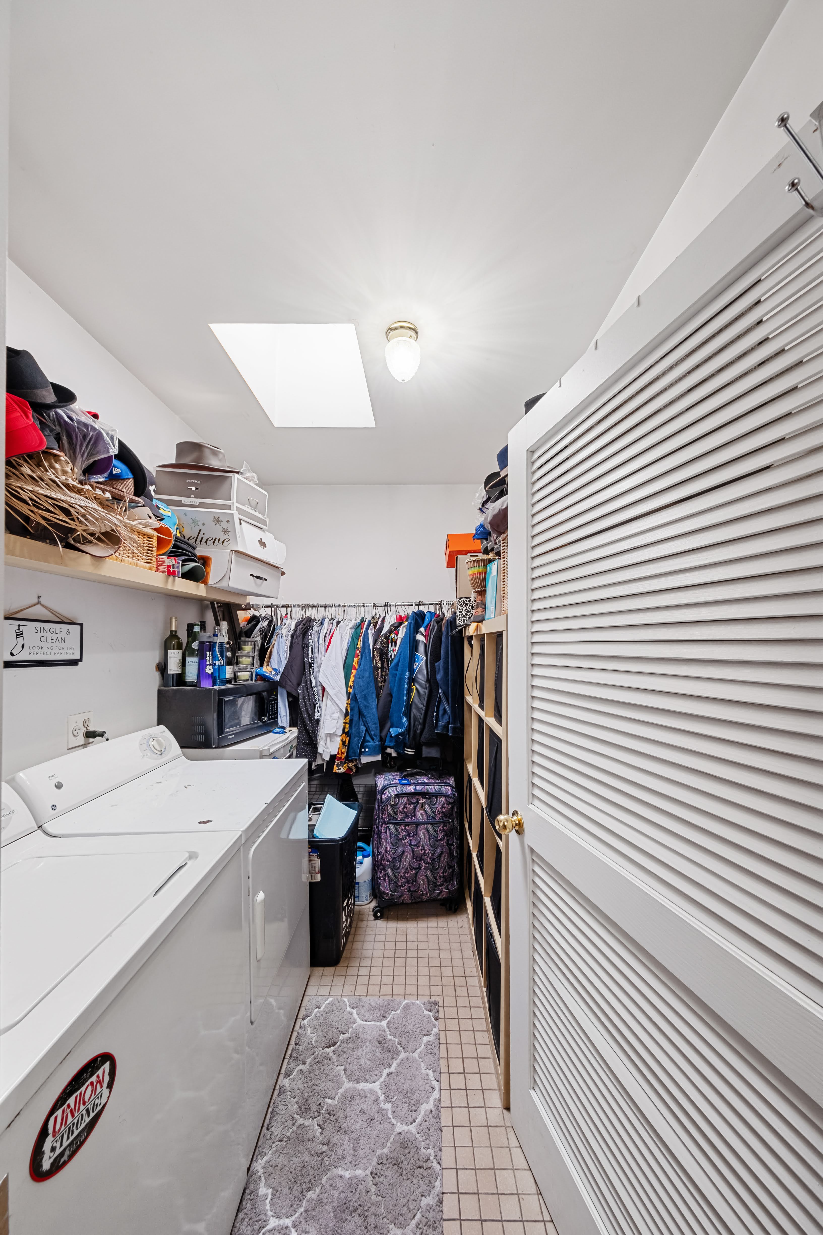 275 Van Buren Street Brooklyn, NY 11221 - Photo 13 of 33 a storage room with washer and dryer