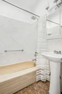 a bathroom with a sink and a bathtub
