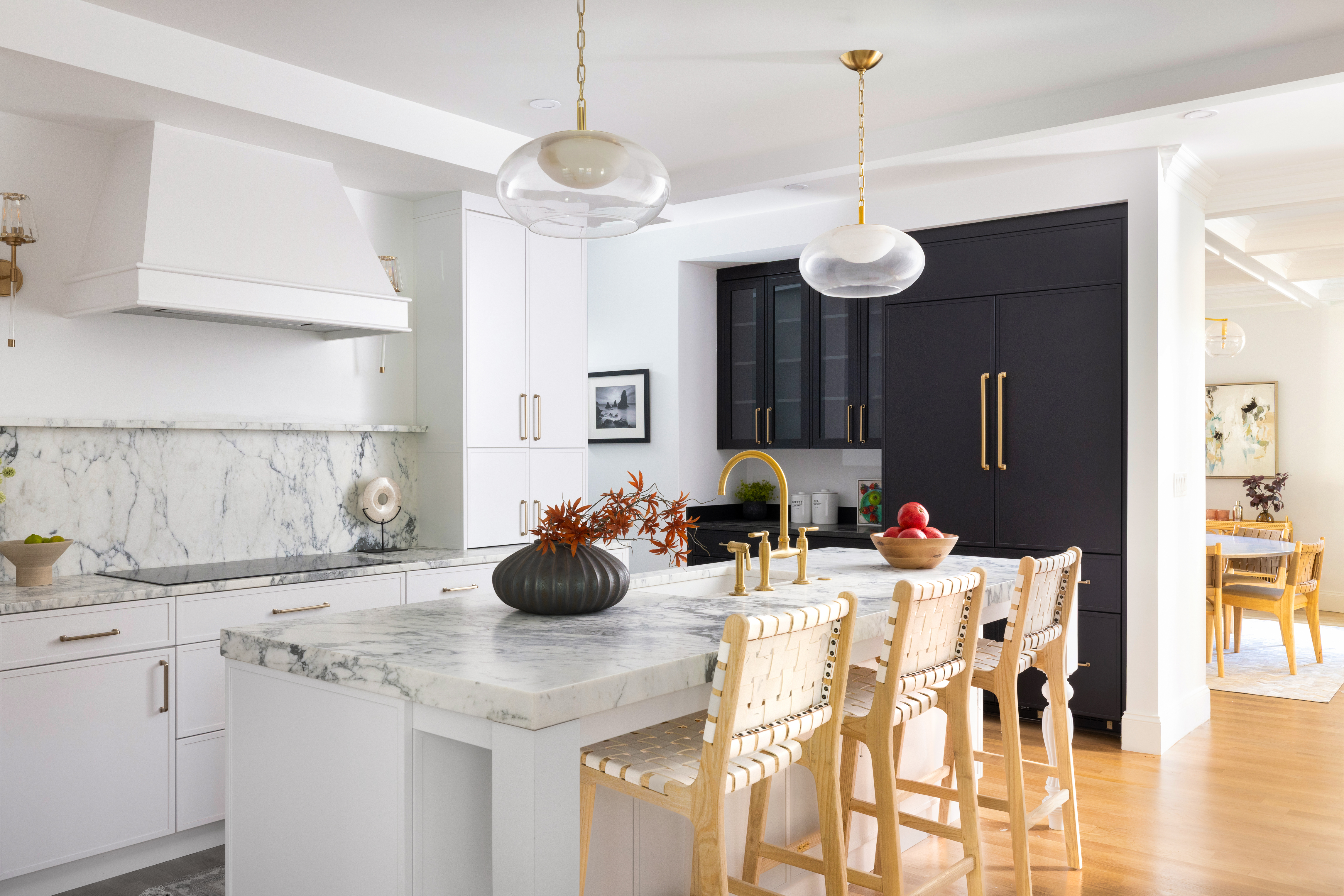 85 Naples Road Brookline, MA 02446 - Photo 9 of 36 a kitchen with a sink a chandelier and living room view