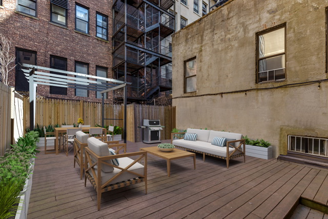 161 Remsen Street, Unit 2C Brooklyn, NY 11242 - Photo 11 of 13 a view of a patio with couches and potted plants on wooden floor