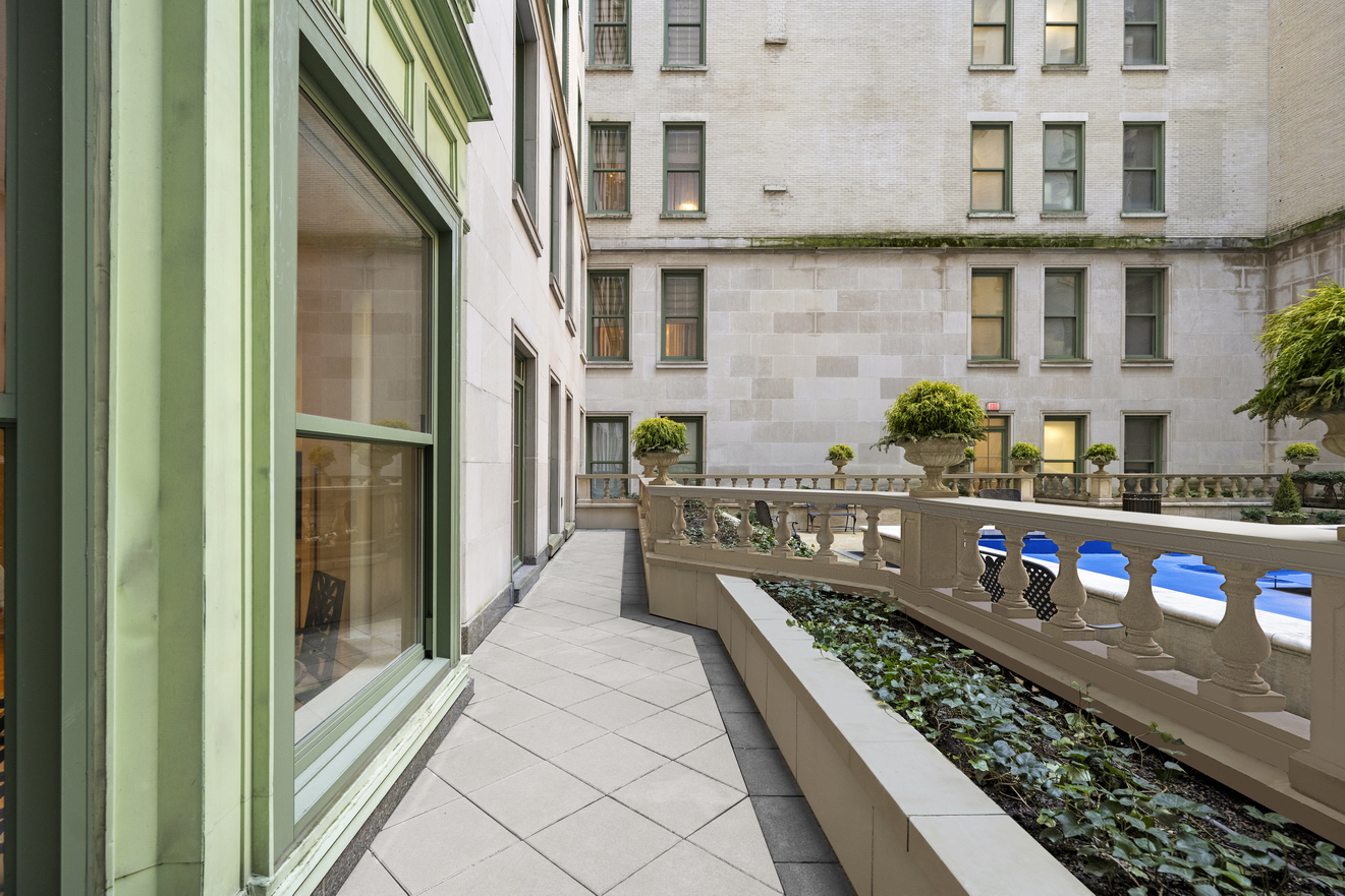 a view of balcony with outdoor seating