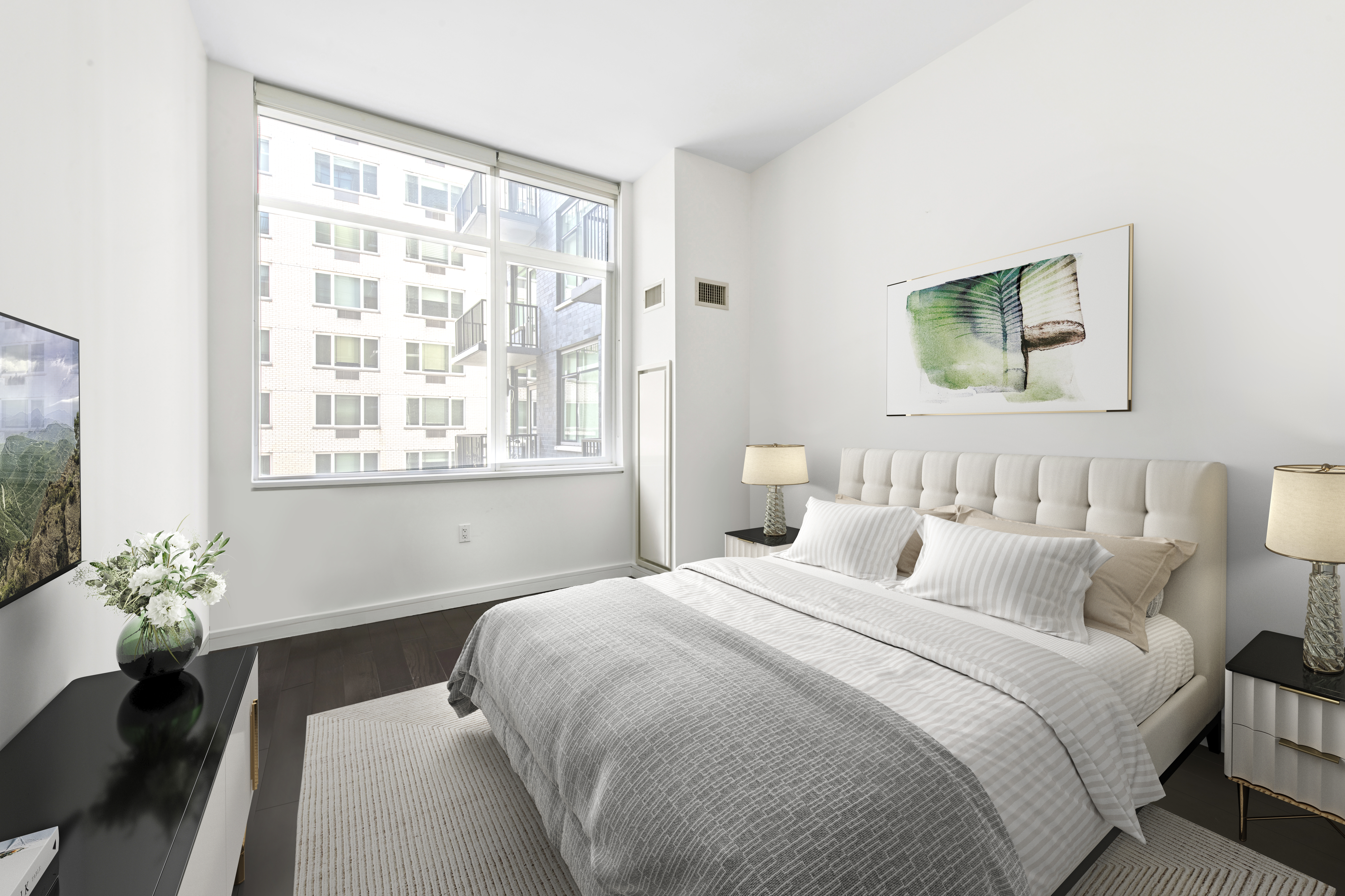 300 East 23rd Street, Unit 7A Manhattan, NY 10010 - Photo 6 of 15 a bedroom with a bed and a window