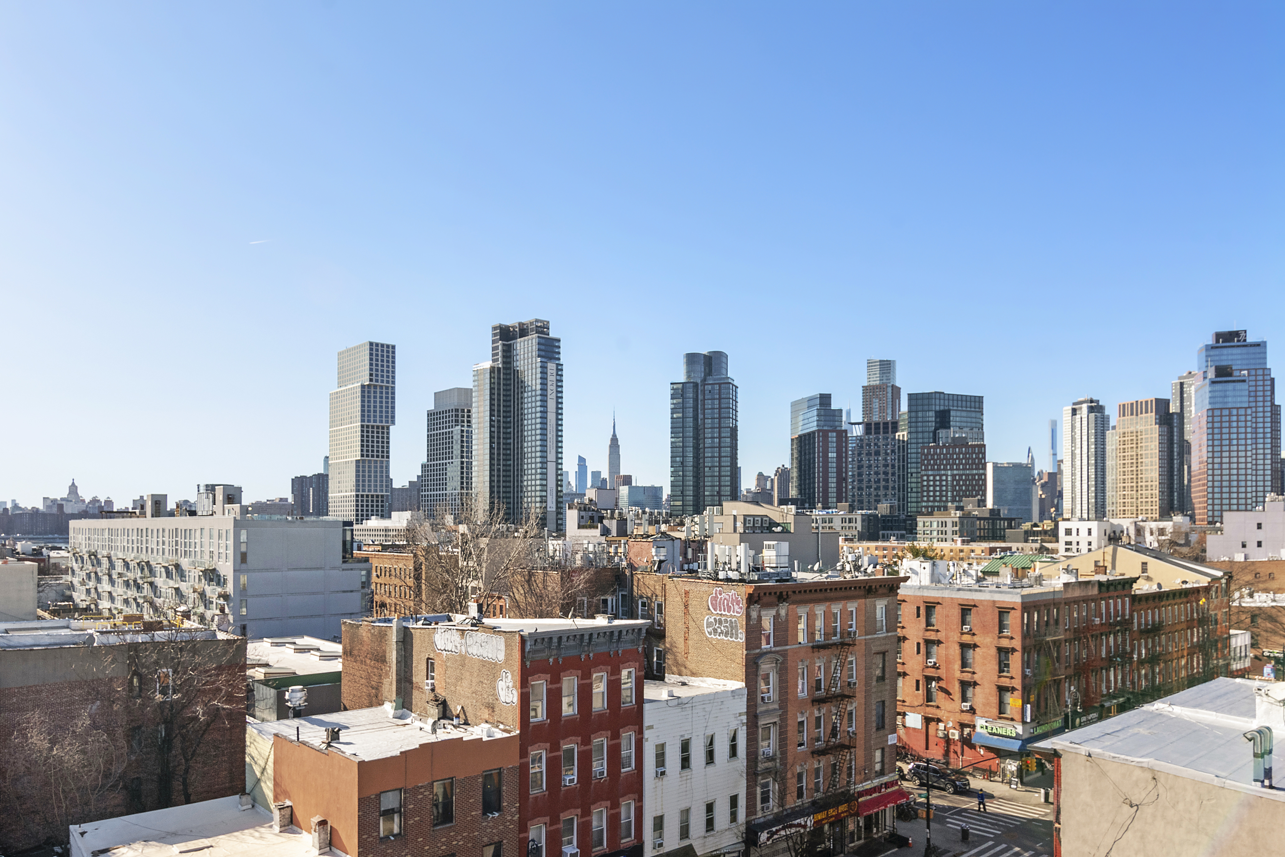 169 Huron Street, Unit 3A Brooklyn, NY 11222 - Photo 5 of 7 a view of a city with tall buildings