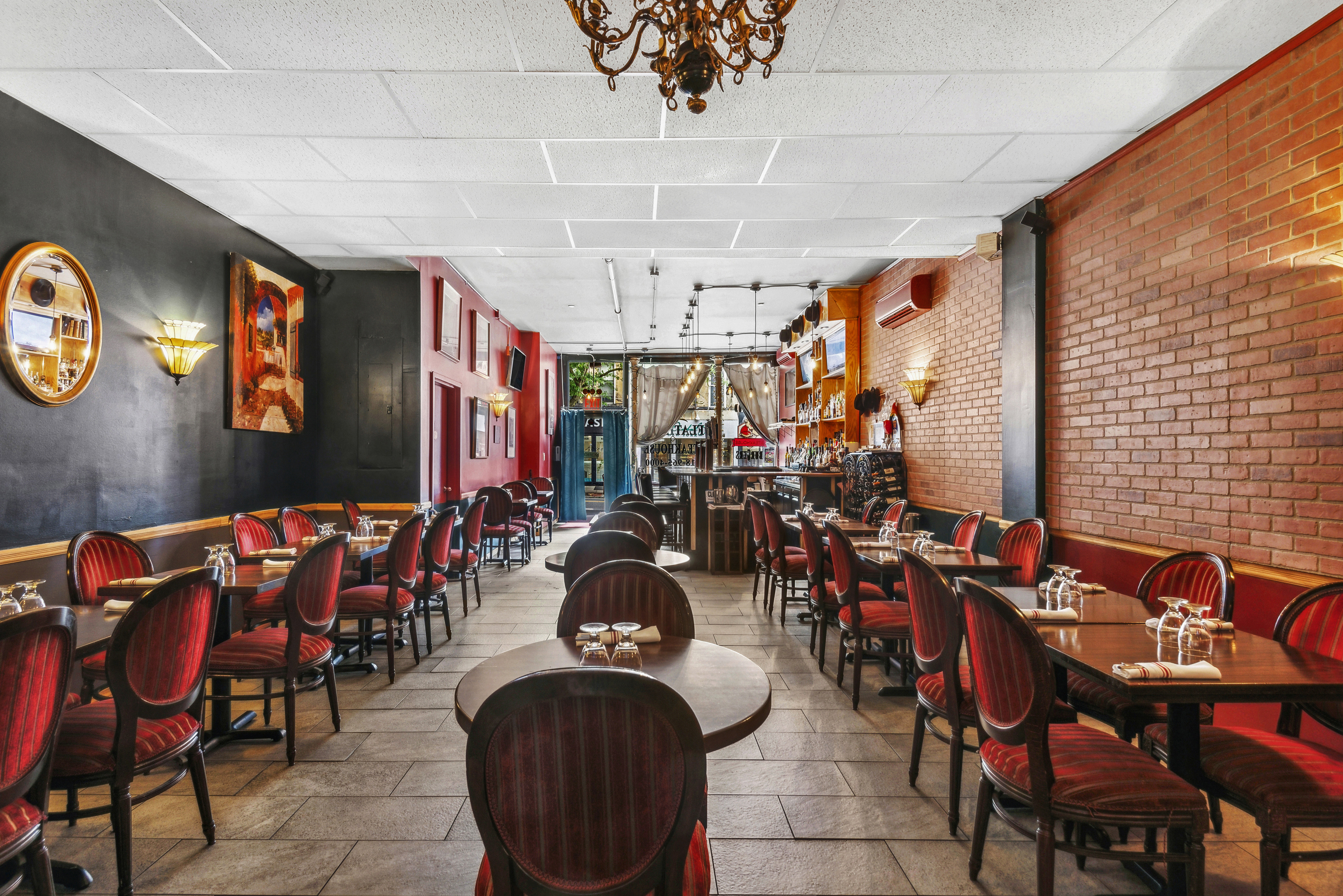 397 5th Avenue Brooklyn, NY 11215 - Photo 3 of 14 a view of a dining area with furniture chandelier and window