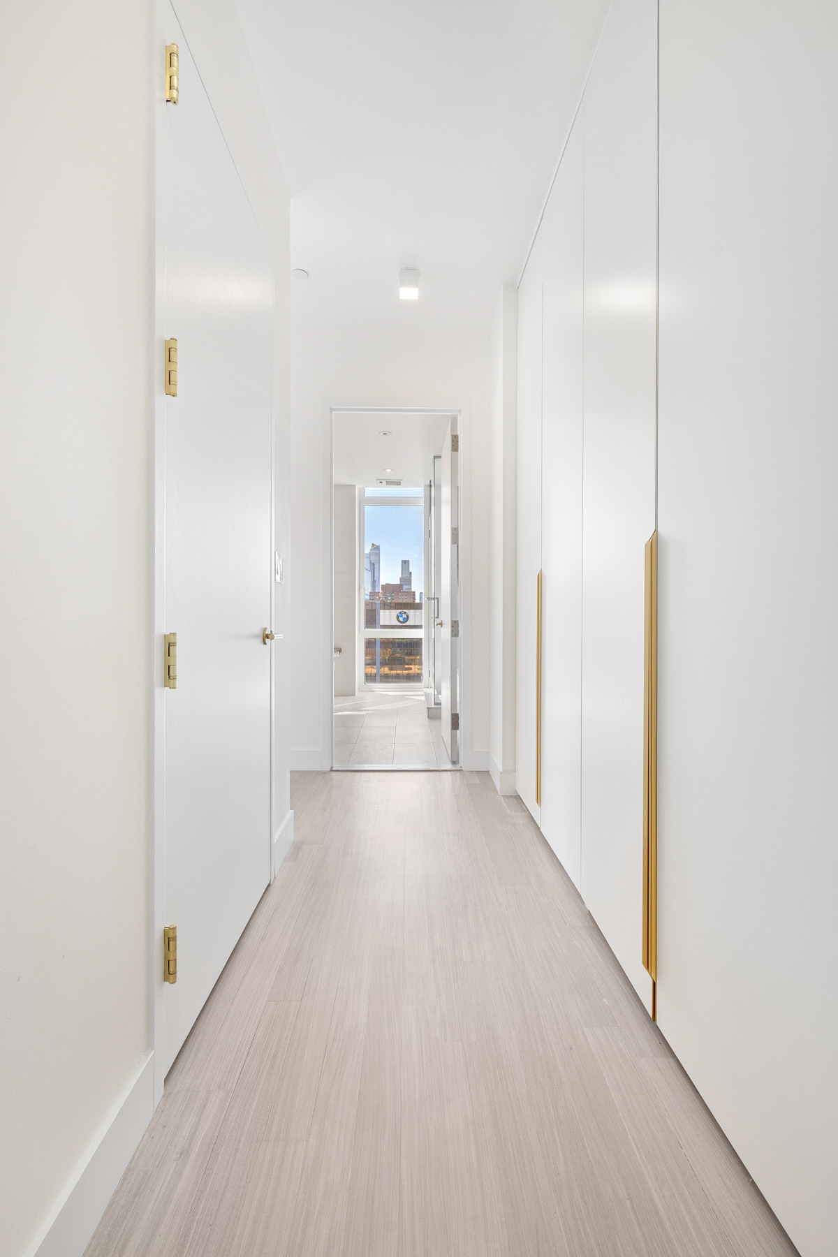 10 West End Avenue, Unit 30C Manhattan, NY 10023 - Photo 11 of 22 a view of a hallway with wooden floor