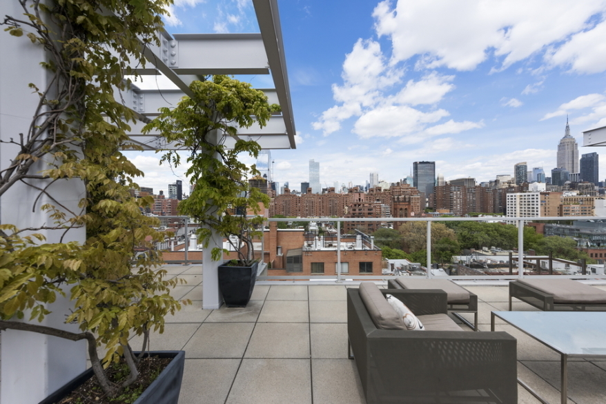 444 West 19th Street, Unit 201 Manhattan, NY 10011 - Photo 11 of 13 a balcony with furniture and a fountain