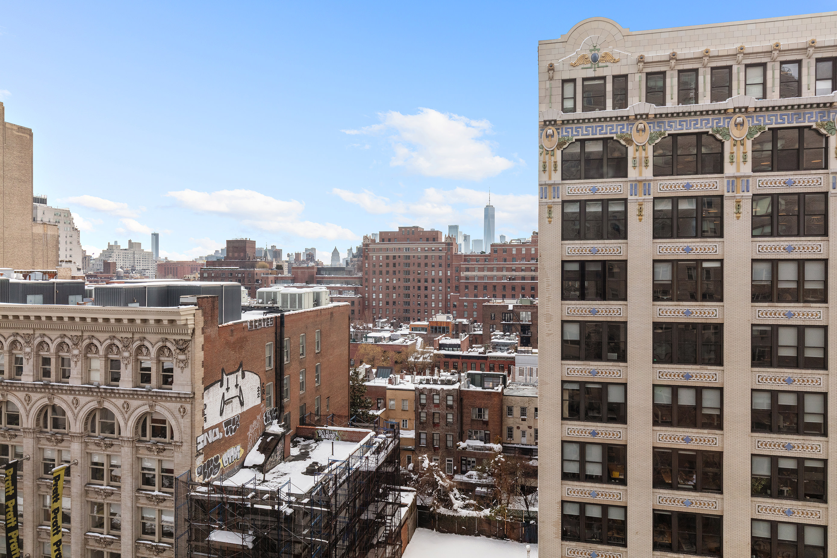77 7th Avenue, Unit 12P Manhattan, NY 10011 - Photo 5 of 15 a city view with tall buildings