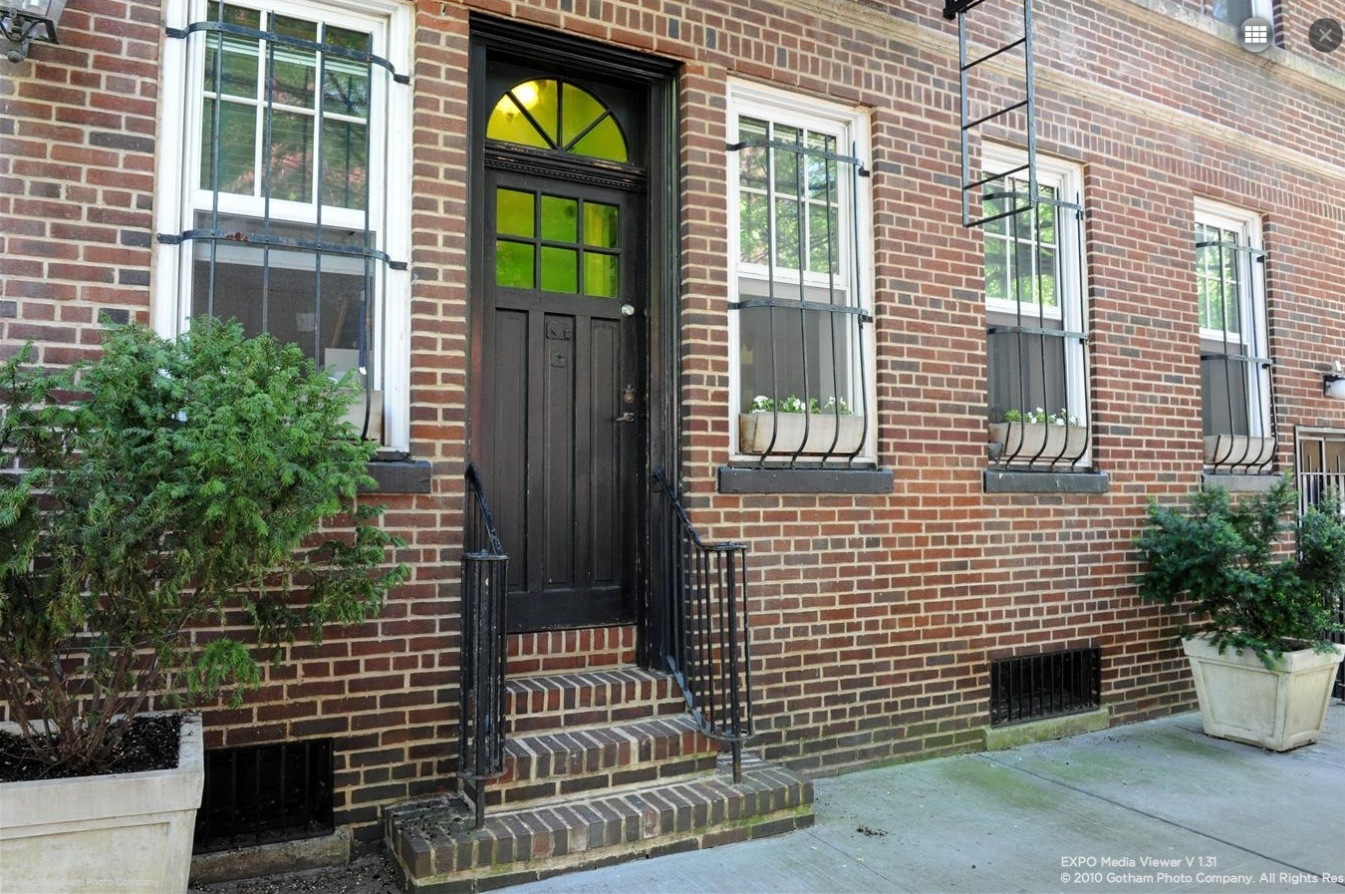 344 West 12th Street, Unit 1A Manhattan, NY 10014 - Photo 1 of 17 a view of a brick house with potted plants