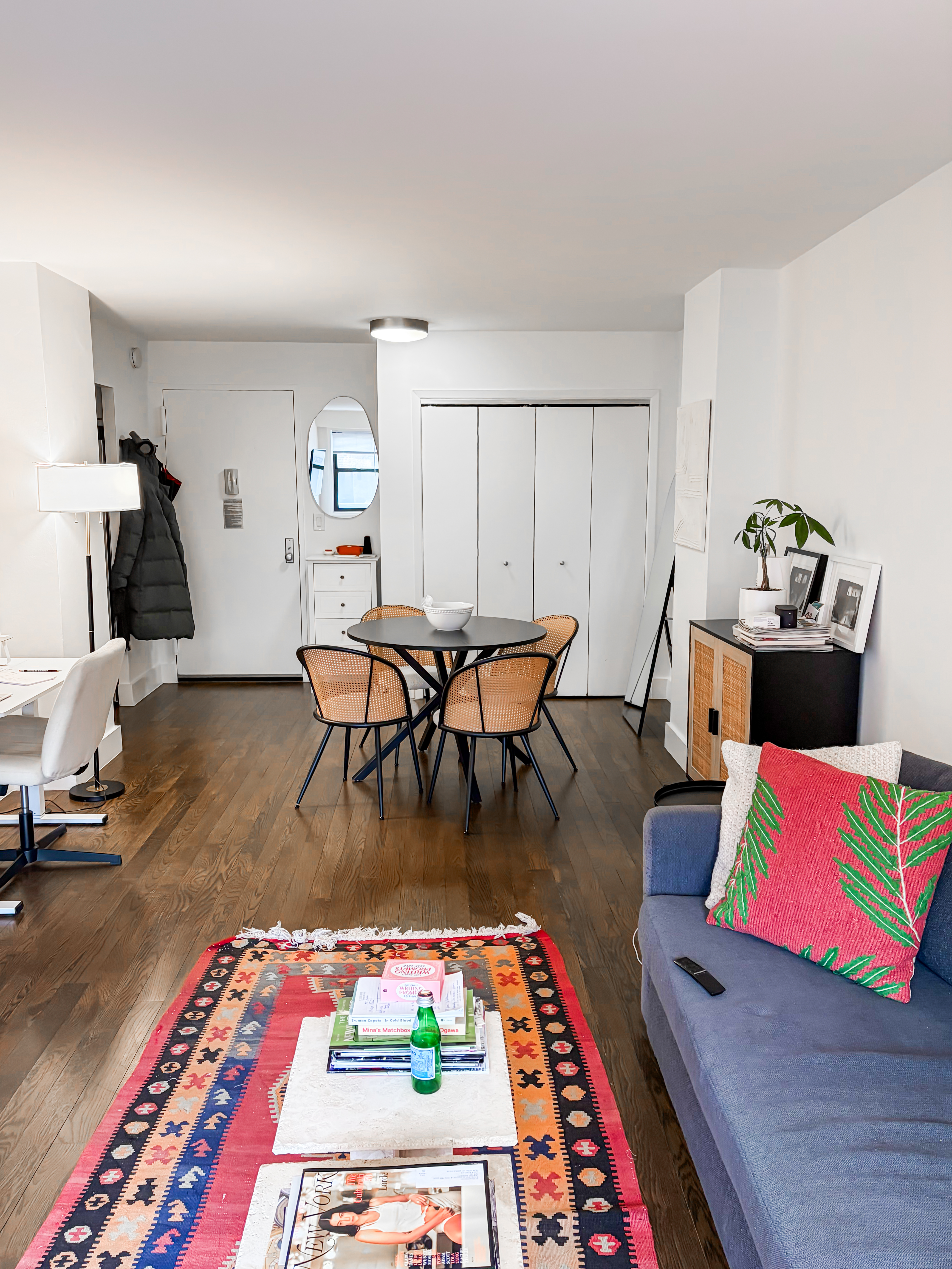 220 East 63rd Street, Unit 4N Manhattan, NY 10065 - Photo 2 of 13 a living room with furniture and a rug