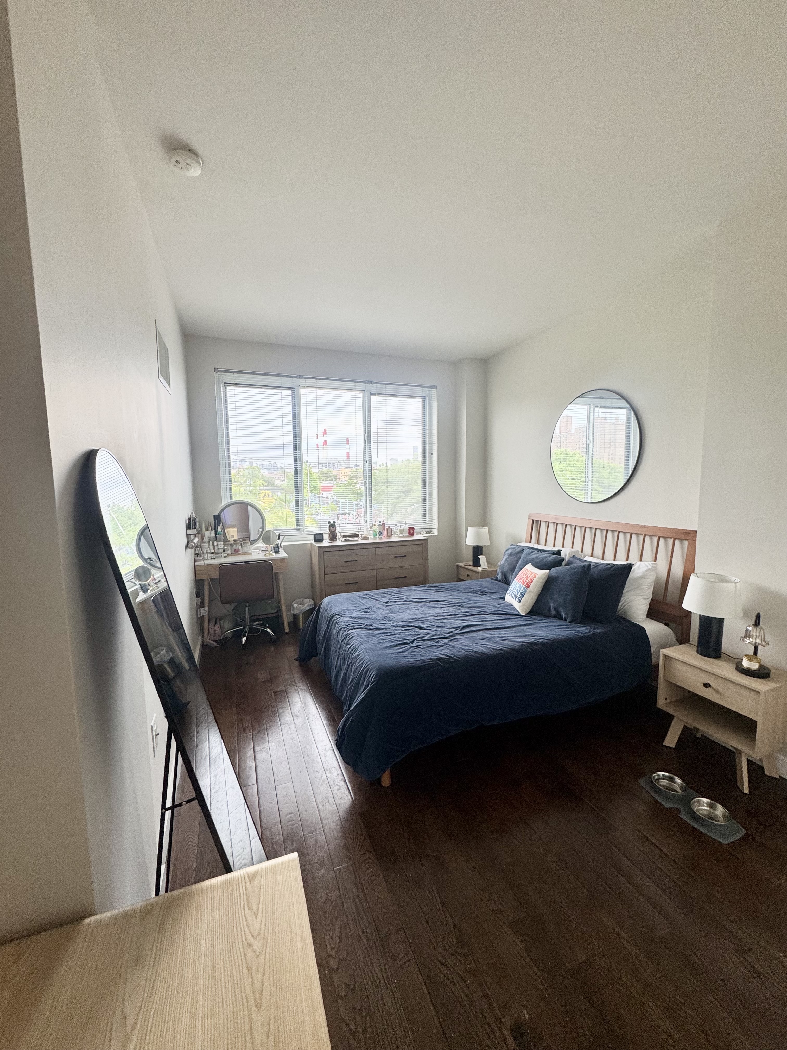 Broadway, Unit 306 Queens, NY 11106 - Photo 6 of 7 a bedroom with a bed window and couch