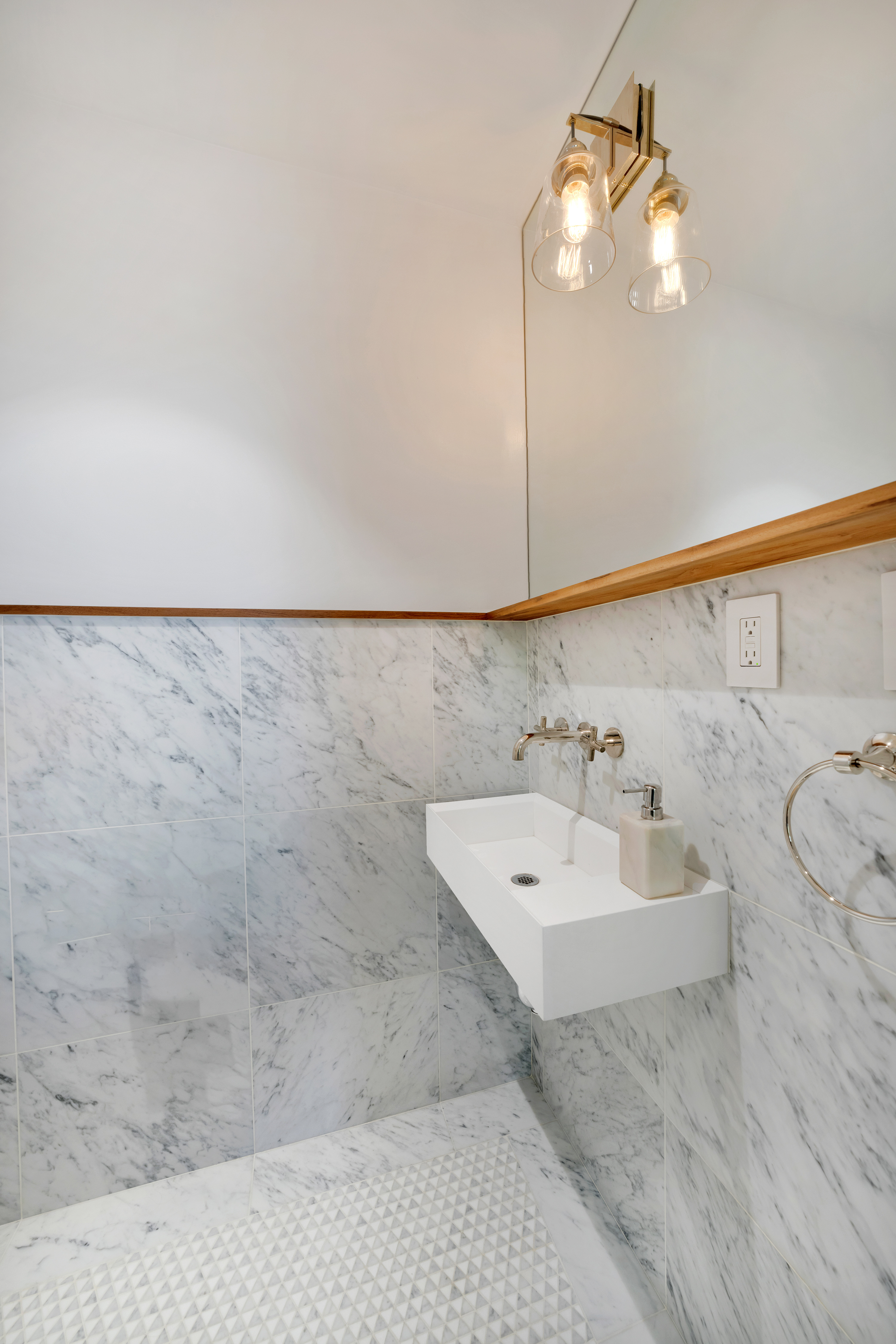 215 Lafayette Avenue, Unit C Brooklyn, NY 11238 - Photo 7 of 17 a bathroom with a sink and a mirror