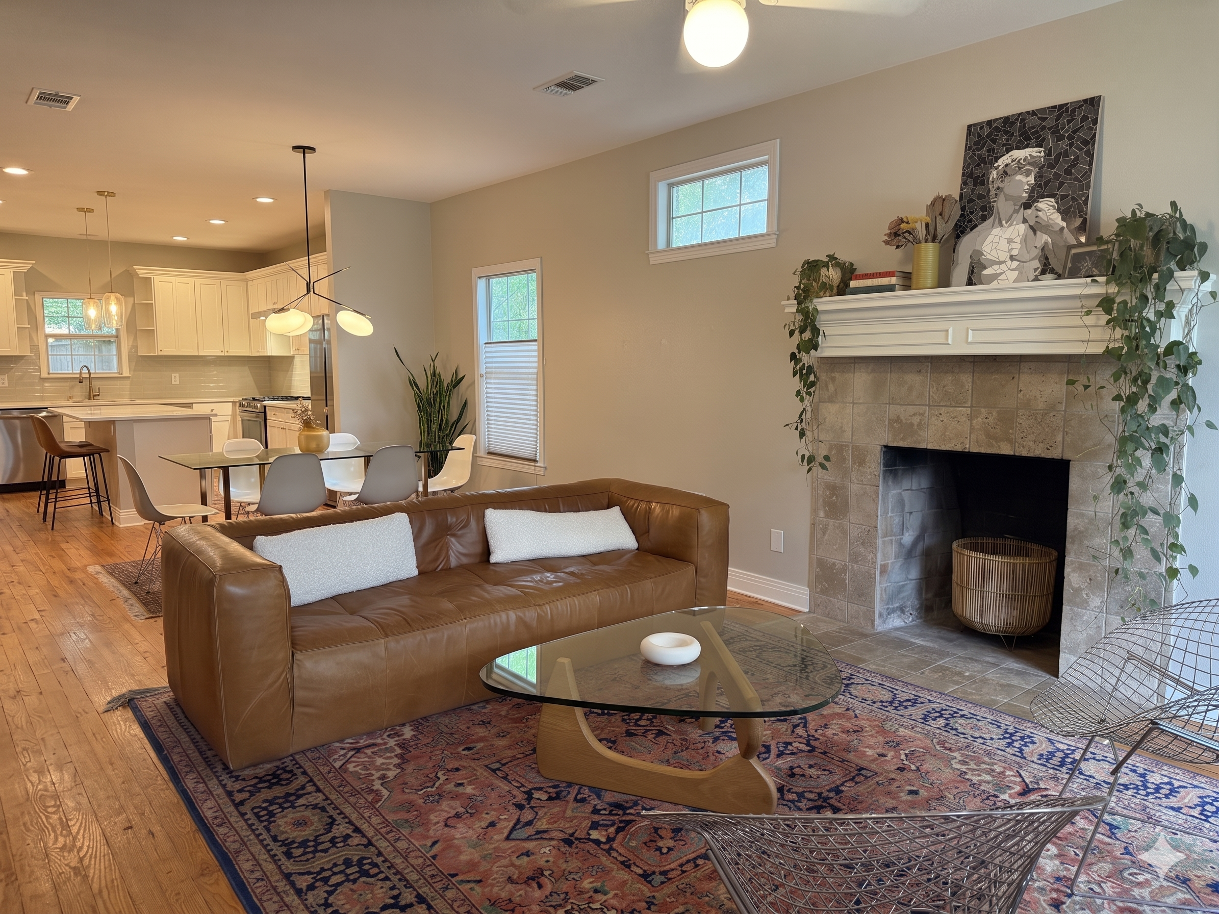 5108 Eilers Avenue Austin, TX 78751 - Photo 2 of 13 a living room with furniture and a fireplace