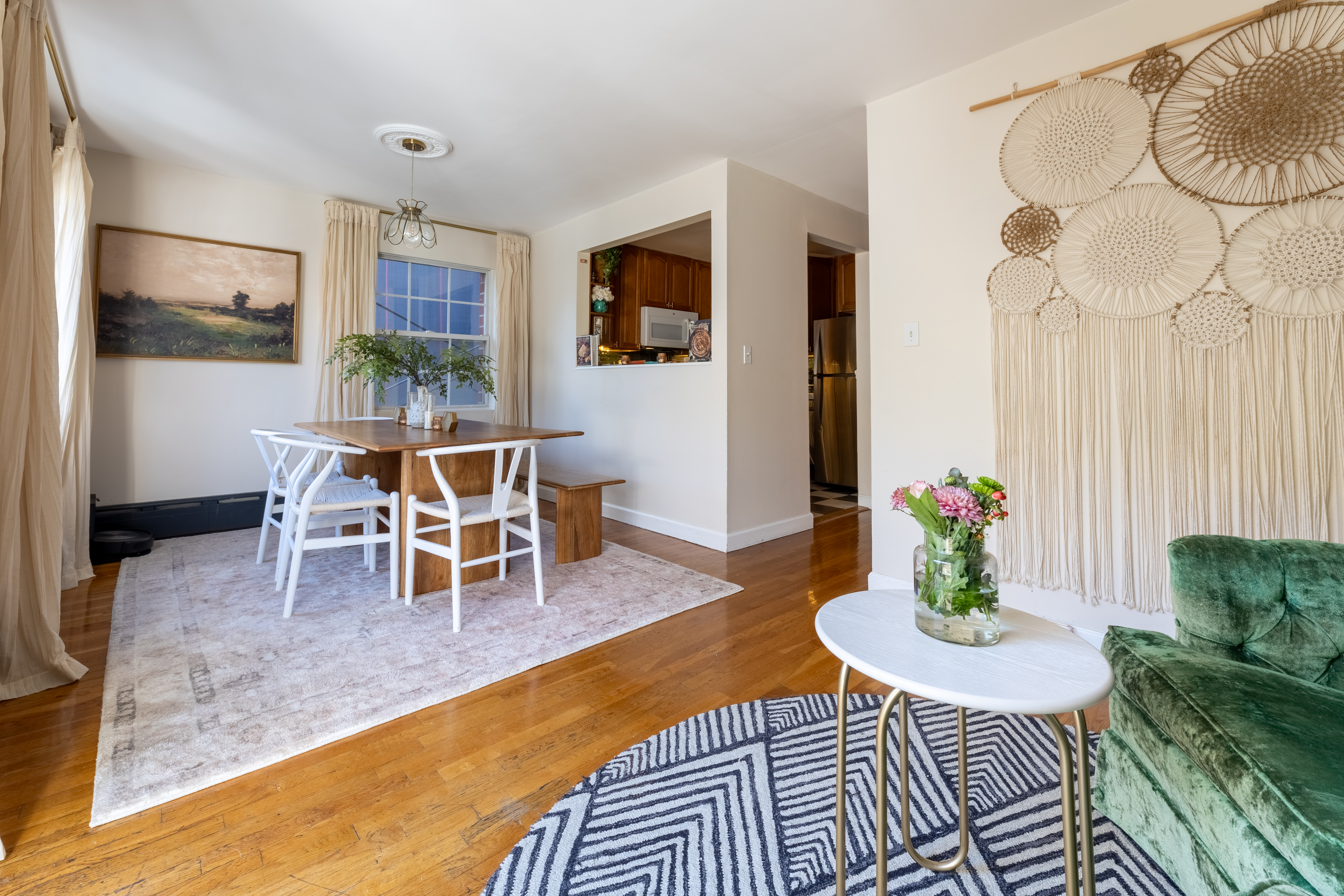 80 South 3rd Street, Unit 2 Brooklyn, NY 11249 - Photo 5 of 15 a living room with furniture dining table and a painting on the wall