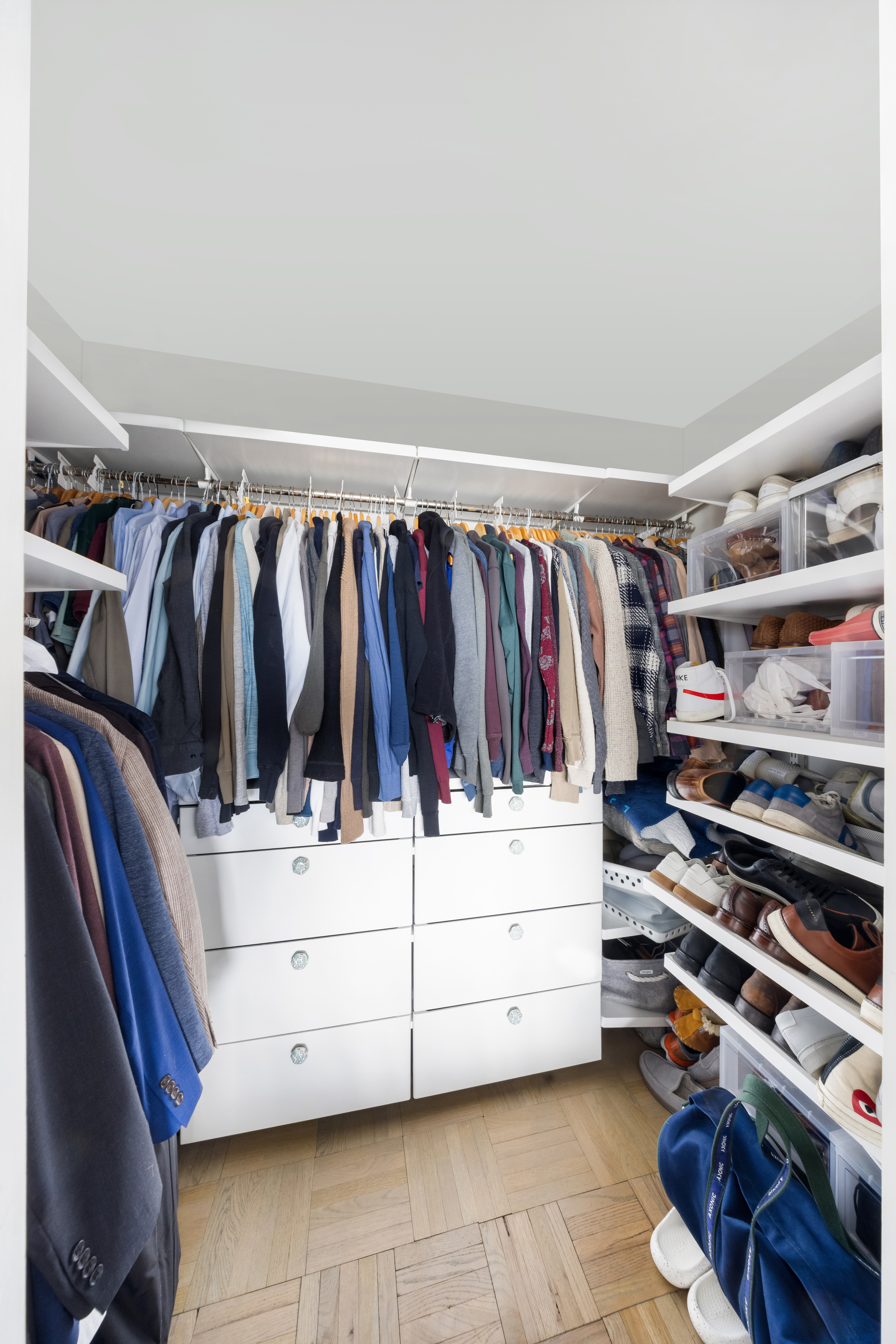 2 Charlton Street, Unit 10F Manhattan, NY 10014 - Photo 10 of 13 a view of walk in closet with clothes and shoes