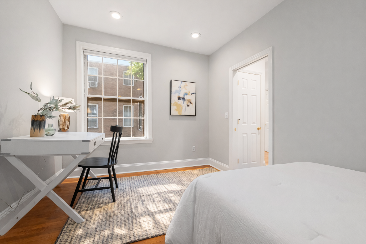 63 West Cedar Street, Unit 3 Boston, MA 02114 - Photo 10 of 17 a bedroom with a bed and a window