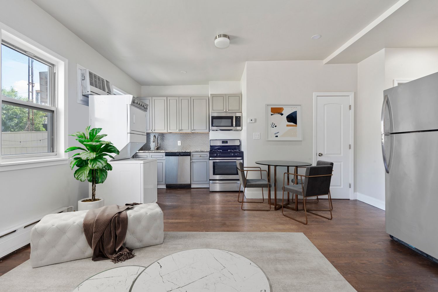 269 Ainslie Street Brooklyn, NY 11211 - Photo 2 of 22 a living room with furniture and a window