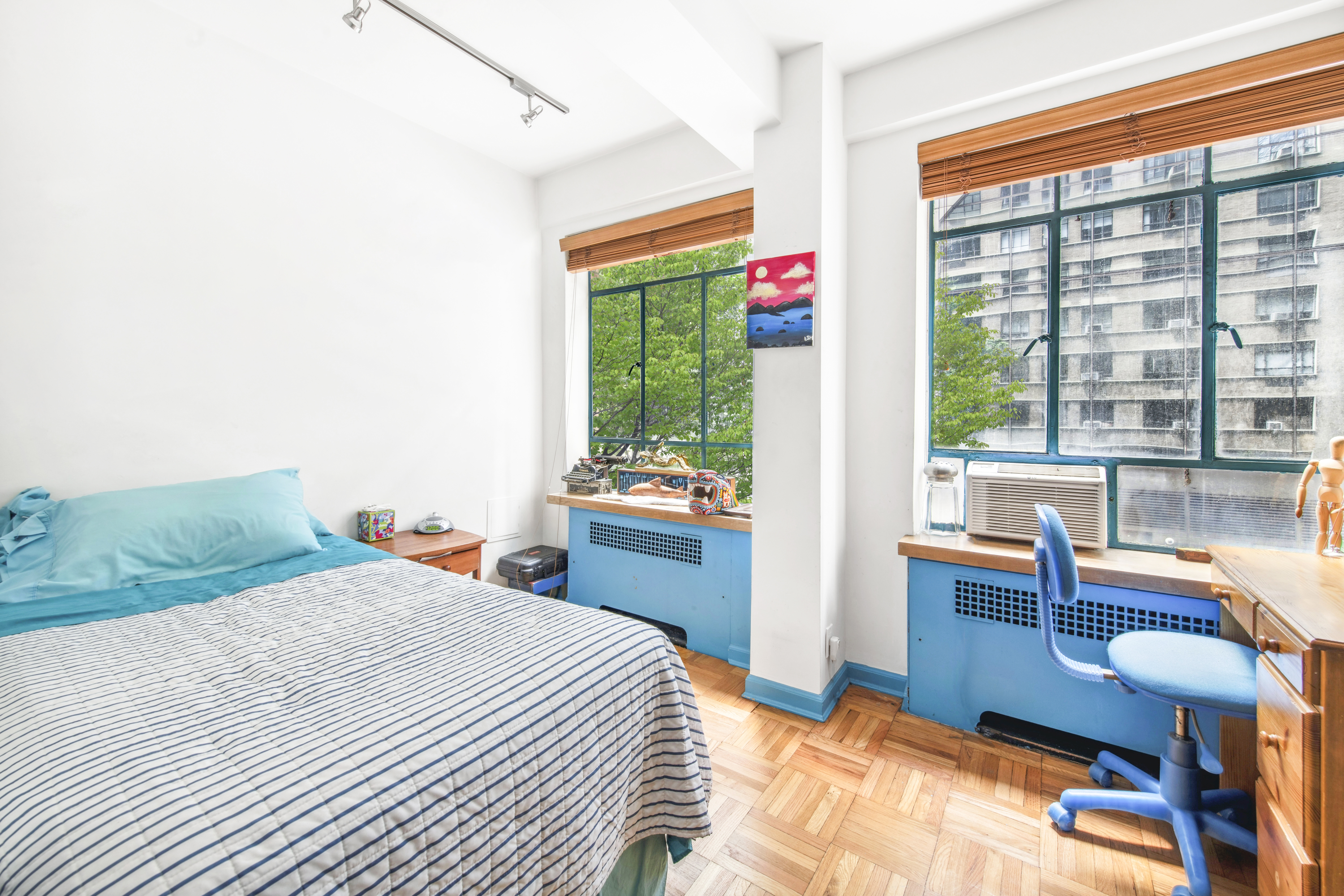 45 West 54th Street, Unit 3CD Manhattan, NY 10019 - Photo 8 of 14 a bedroom with a bed and a table