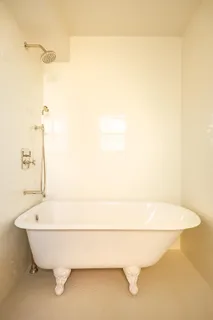 a bathroom with a white tub
