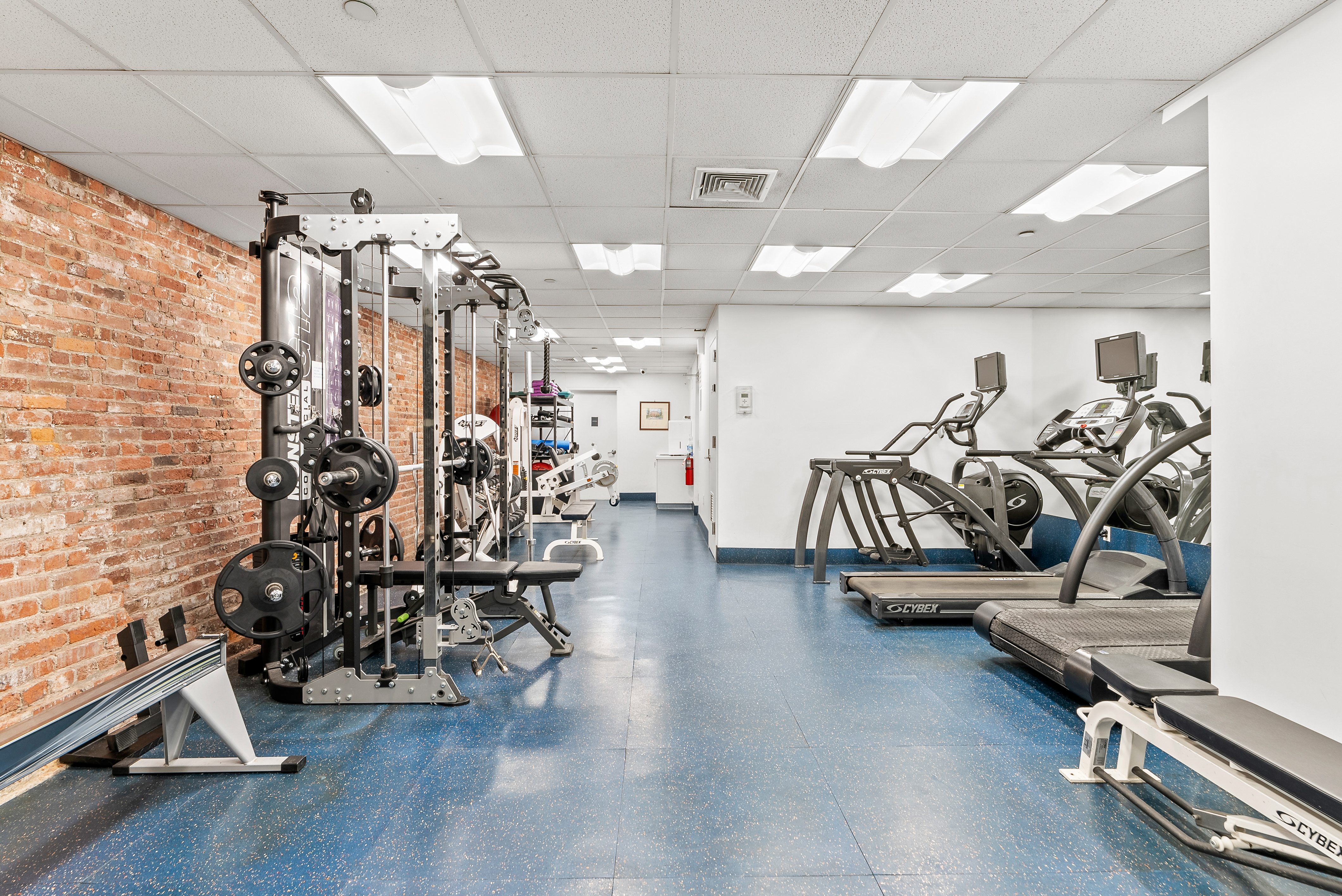 15 West 20th Street, Unit 9A Manhattan, NY 10011 - Photo 18 of 21 a view of a room with gym equipment
