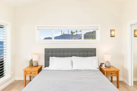 a living room with a couch and white walls