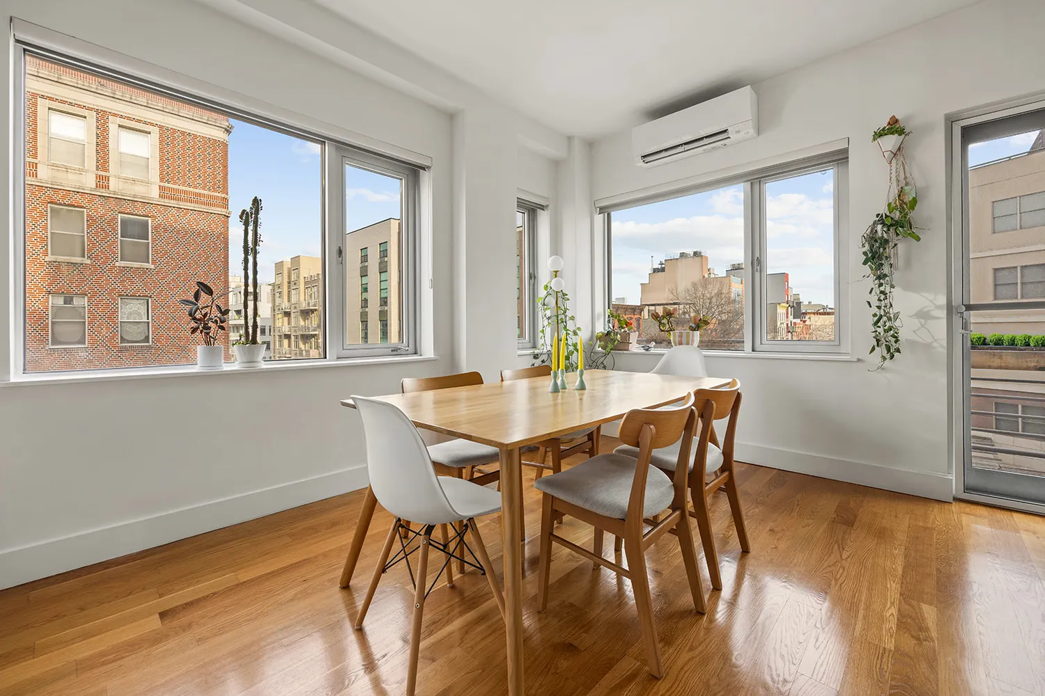a dining room with furniture window wooden floor