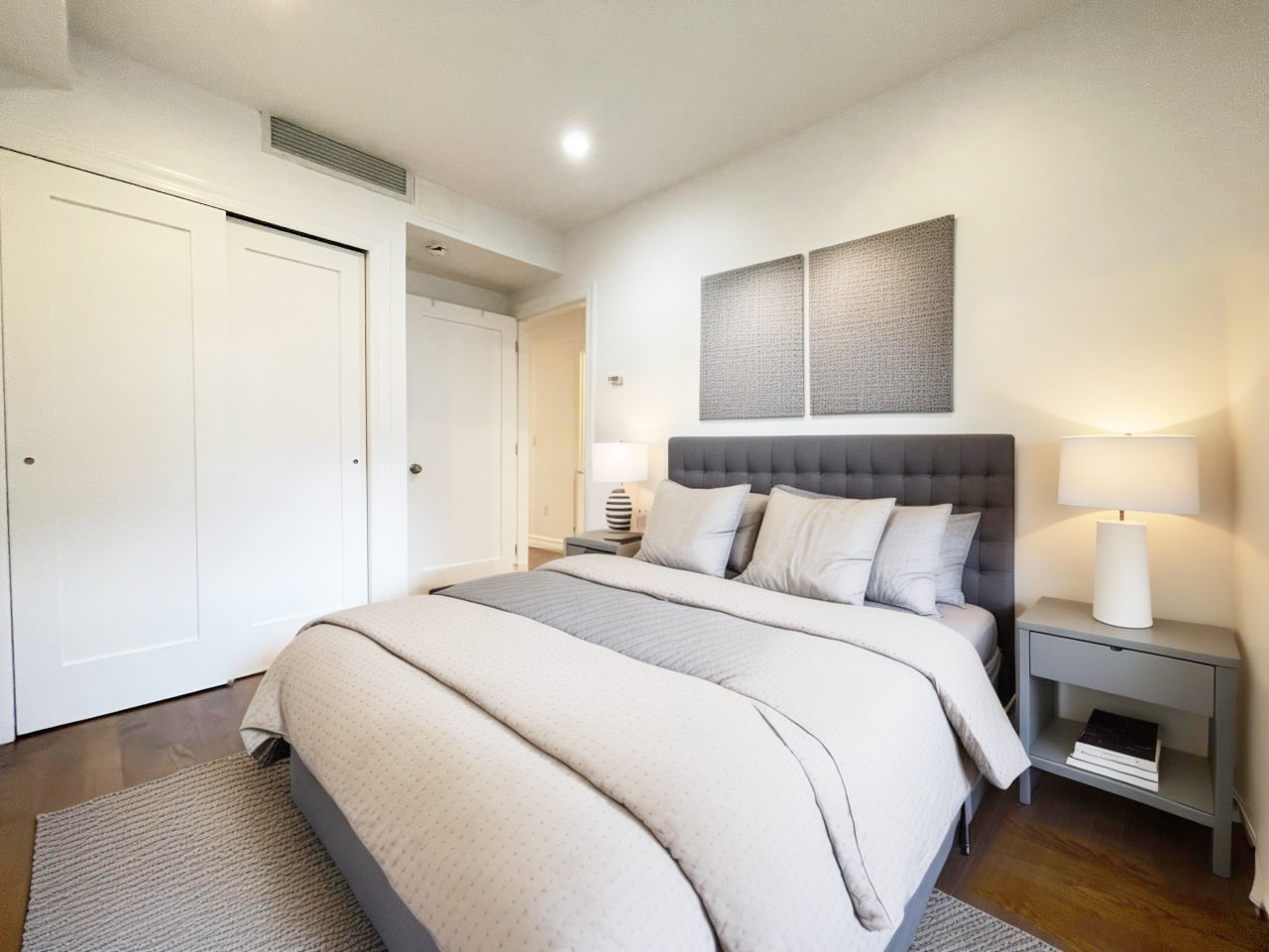 157 Prospect Avenue, Unit 1 Brooklyn, NY 11215 - Photo 4 of 10 a bedroom with a bed and a lamp