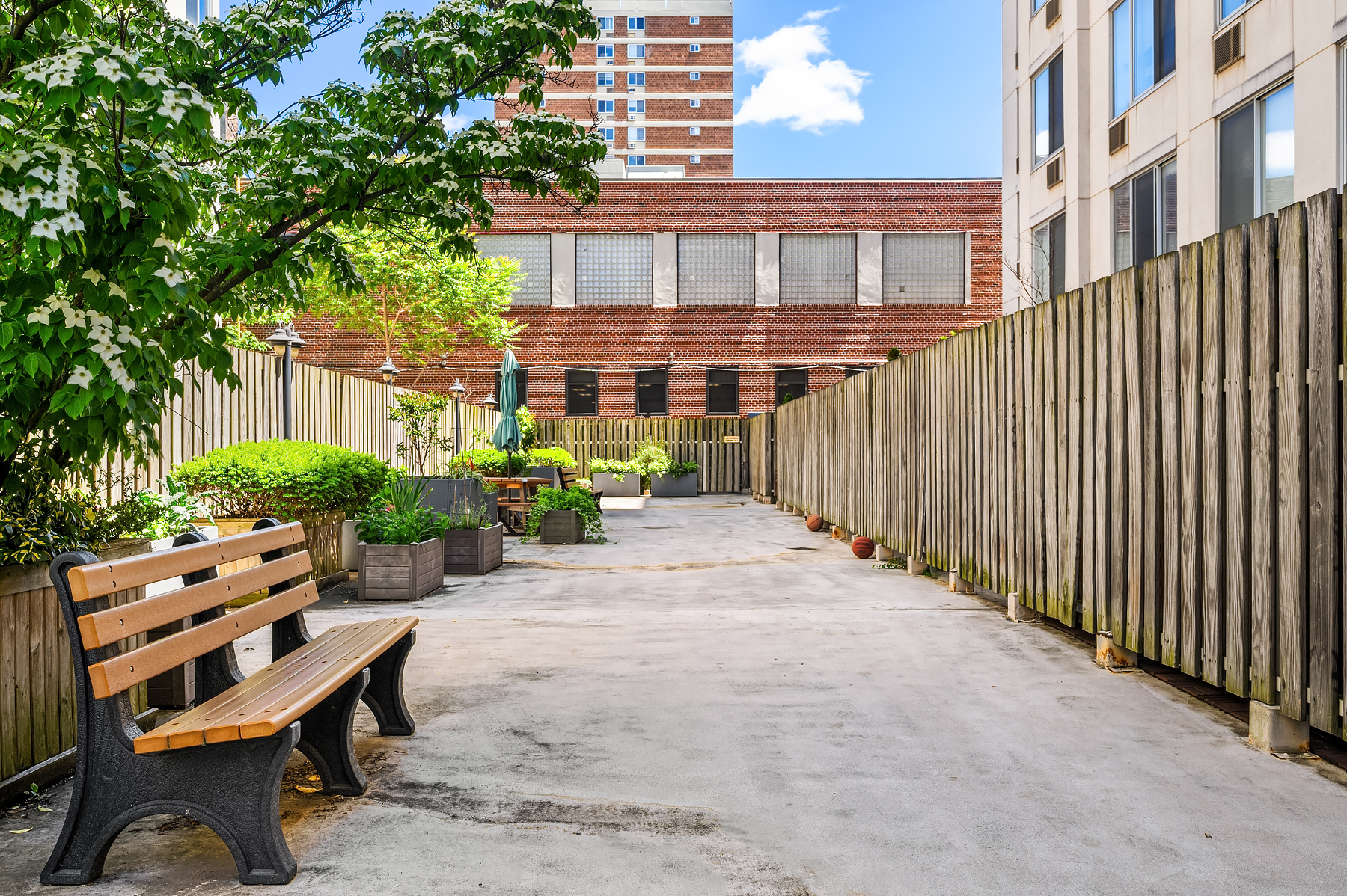 29 West 138th Street, Unit 5A Manhattan, NY 10037 - Photo 7 of 9 a view of a patio with couches and potted plants