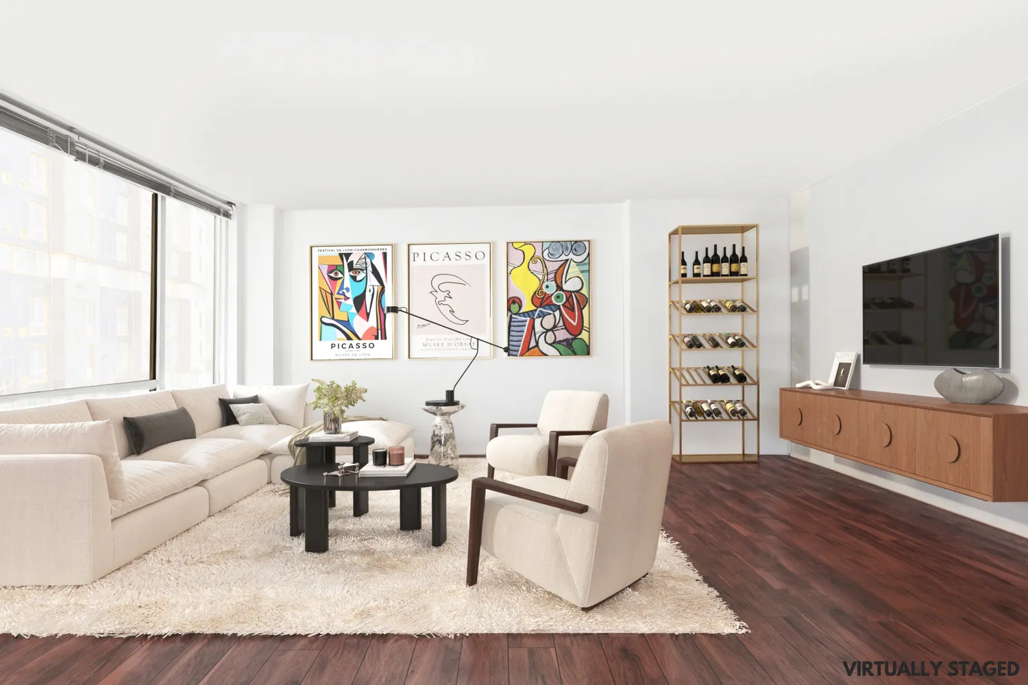 a living room with furniture and a flat screen tv