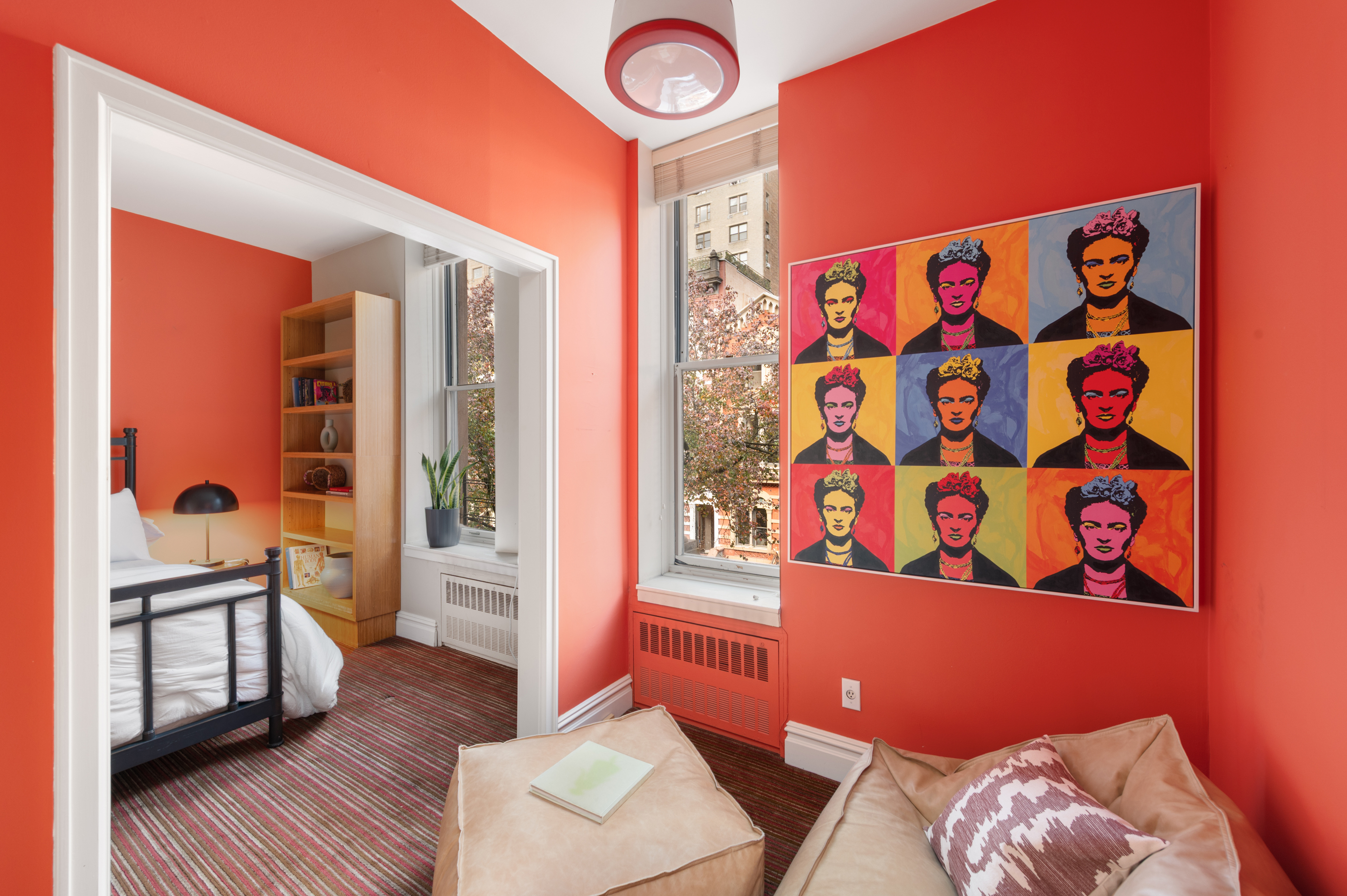 126 West 78th Street Manhattan, NY 10024 - Photo 15 of 39 a living room with furniture and a window