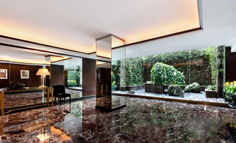 a view of a building with sitting area