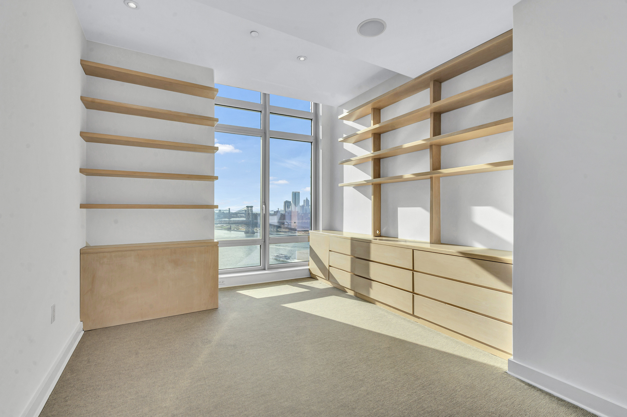 2 Northside Piers, Unit PH2 Brooklyn, NY 11249 - Photo 23 of 27 a room with furniture and a window