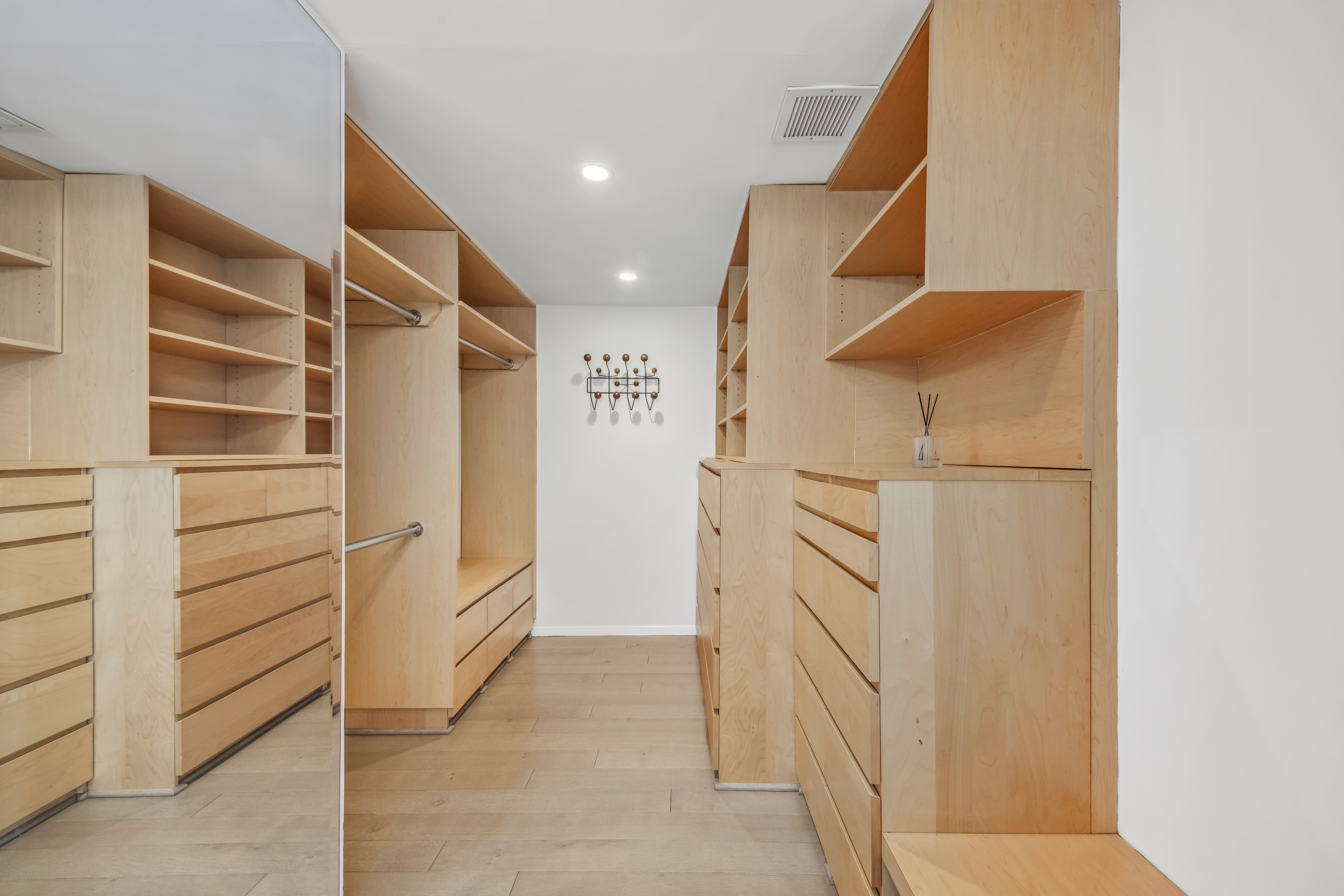 870 United Nations Plaza, Unit 15E Manhattan, NY 10017 - Photo 7 of 19 a view of walk in closet