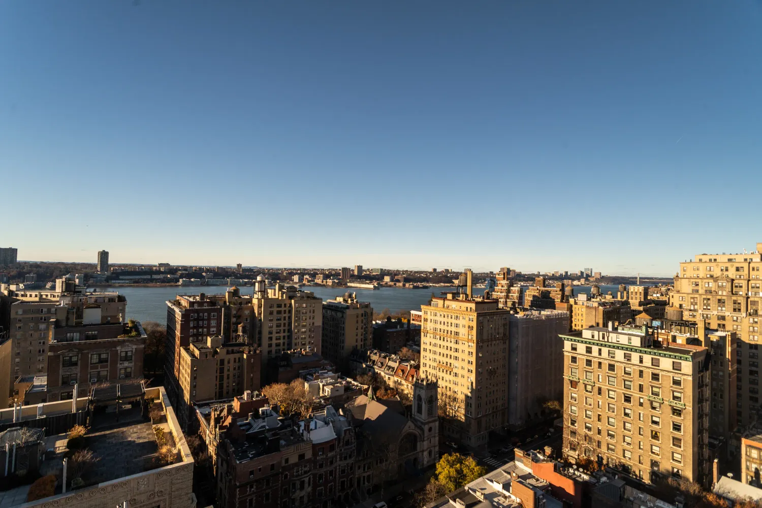 a view of a city with tall buildings