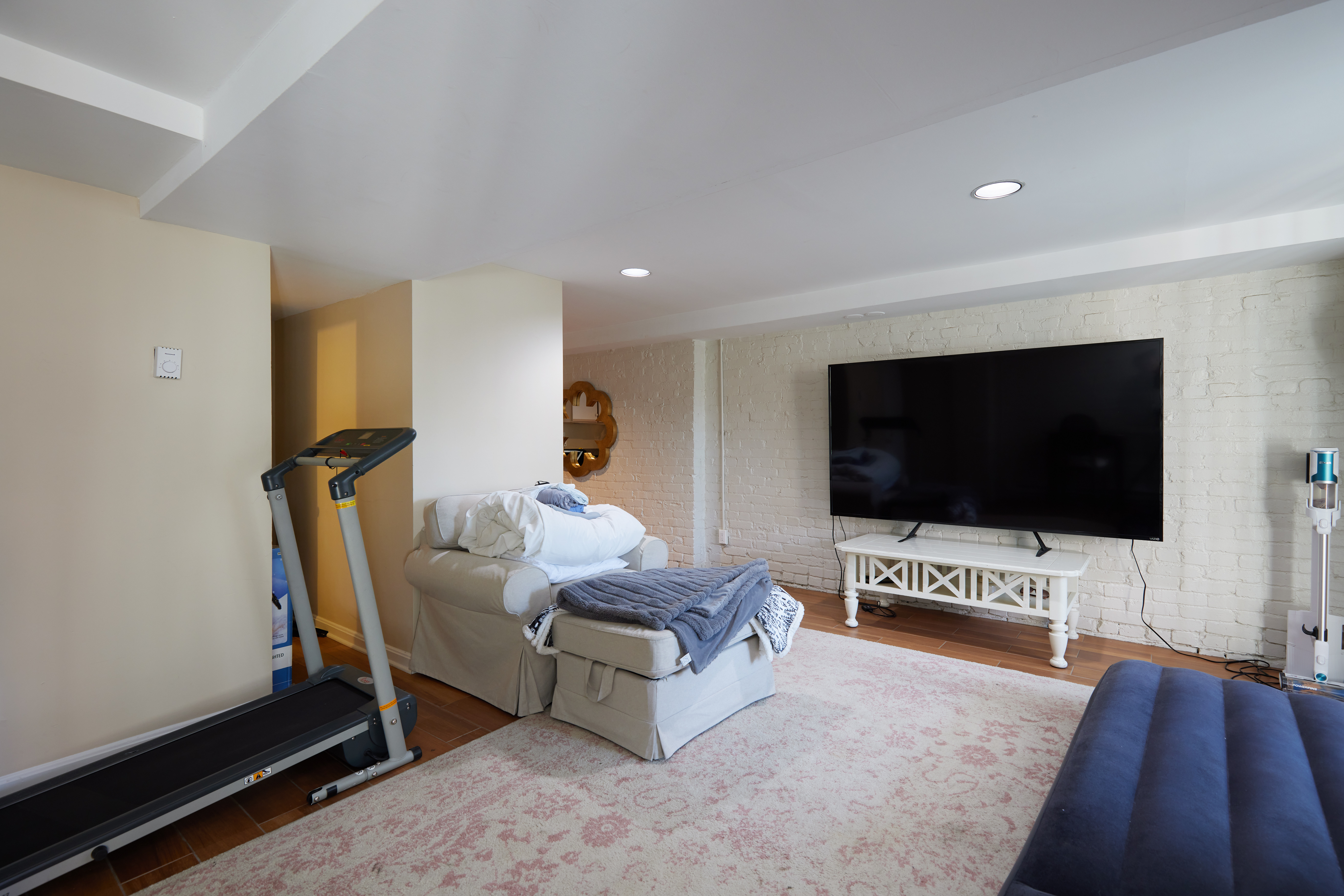 3420 R Street Northwest Washington, DC 20007 - Photo 18 of 53 a living room with furniture and a flat screen tv