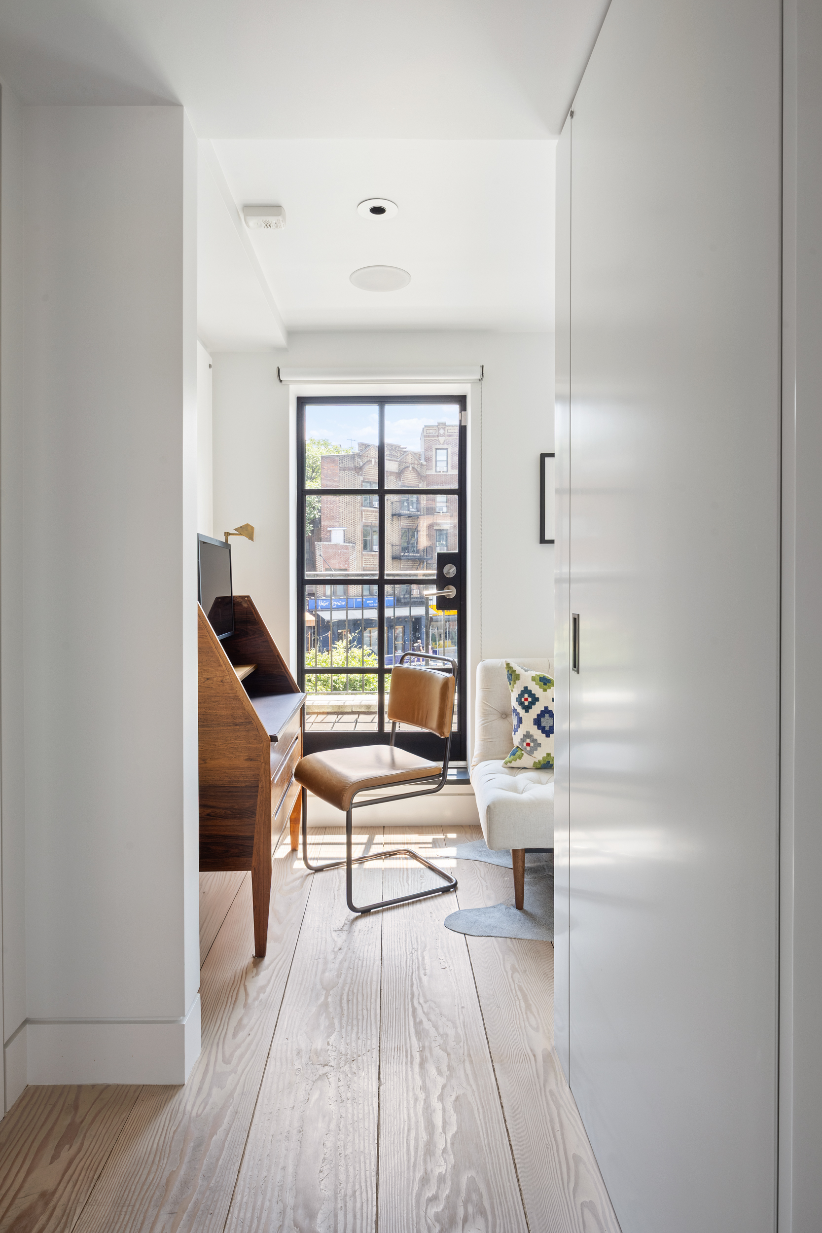 39 Barrow Street Manhattan, NY 10014 - Photo 20 of 39 a living room with furniture and wooden floor