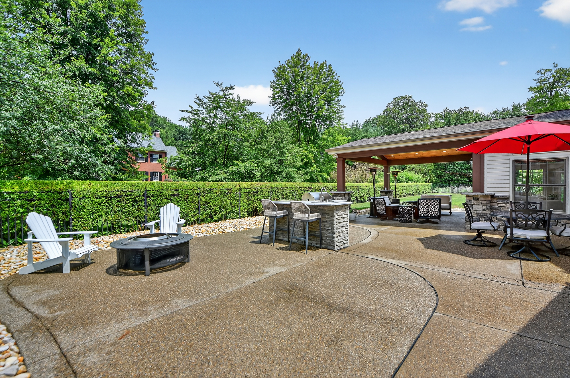 1205 Beaver Road Sewickley, PA 15143 - Photo 82 of 94 a view of a backyard with sitting area and outdoor kitchen