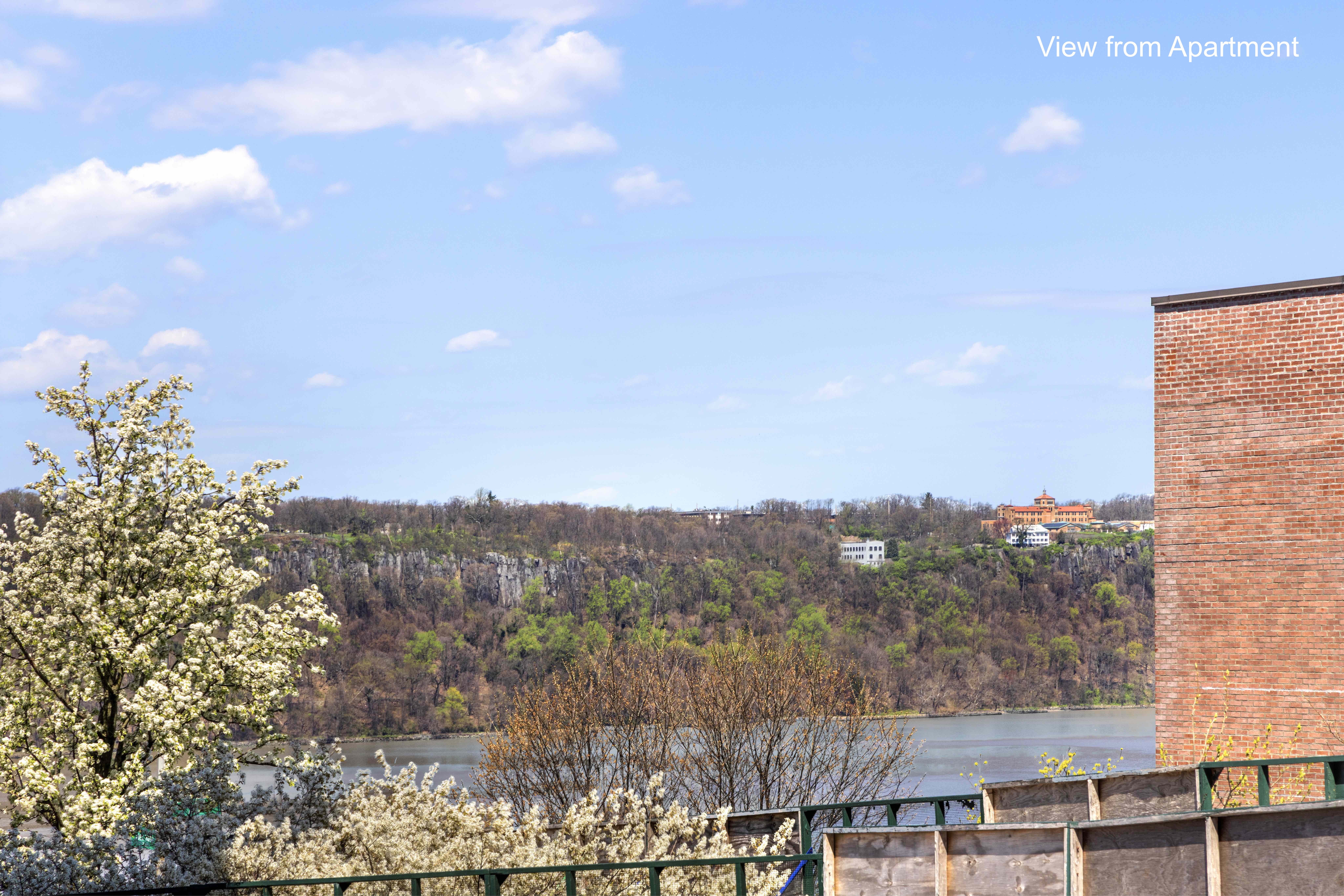 200 Cabrini Boulevard, Unit 17 Manhattan, NY 10033 - Photo 3 of 24 a view of city and mountain