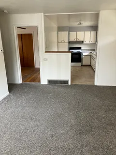 a view of a kitchen with a sink